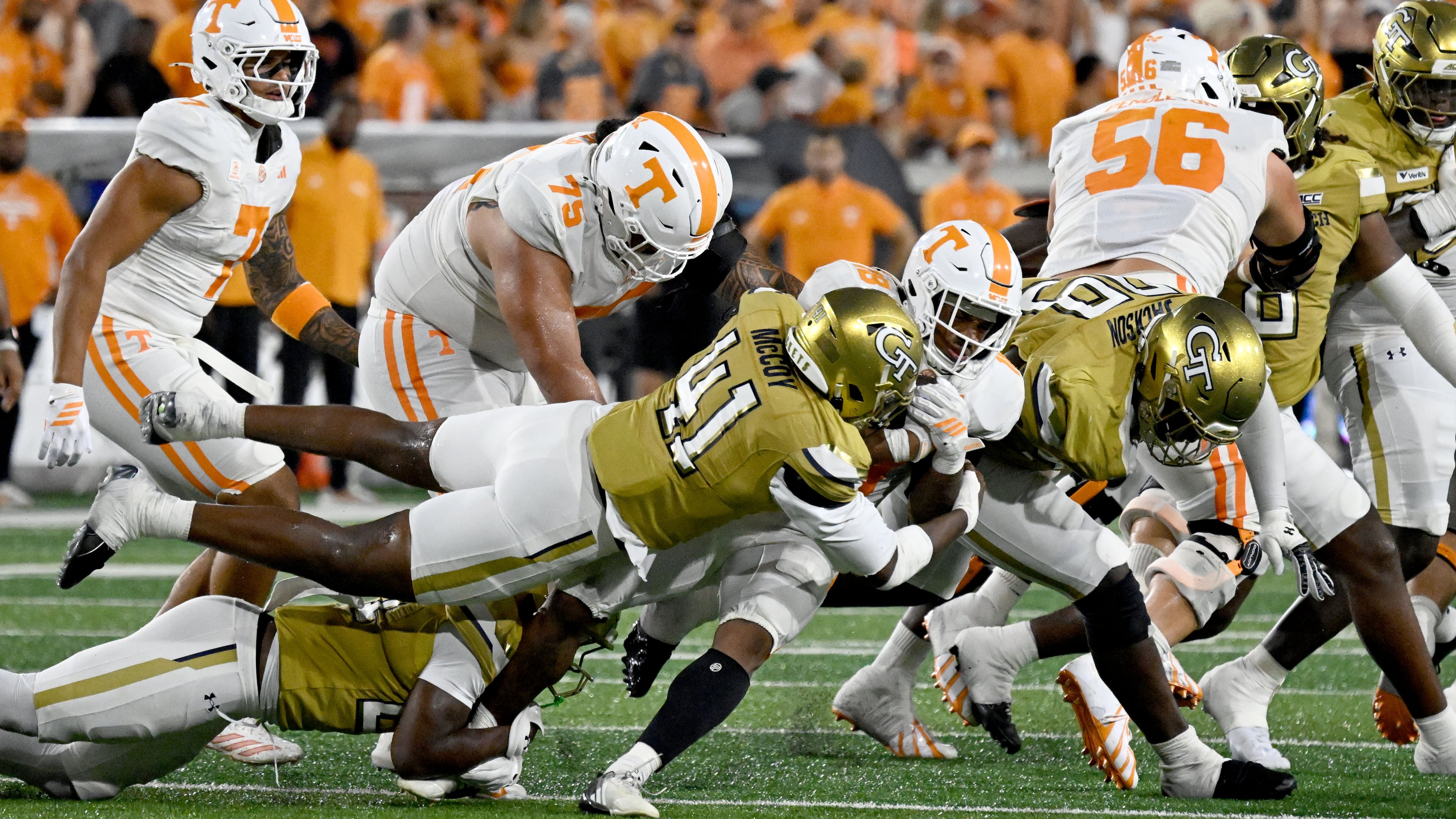 Tennessee running back DeSean Bishop gets tackled by Georgia Tech defensive end Taje McCoy on Saturday, Sept. 12, 2026. Tennessee defeated Georgia Tech 45-24. (Hyosub Shin/AJC)