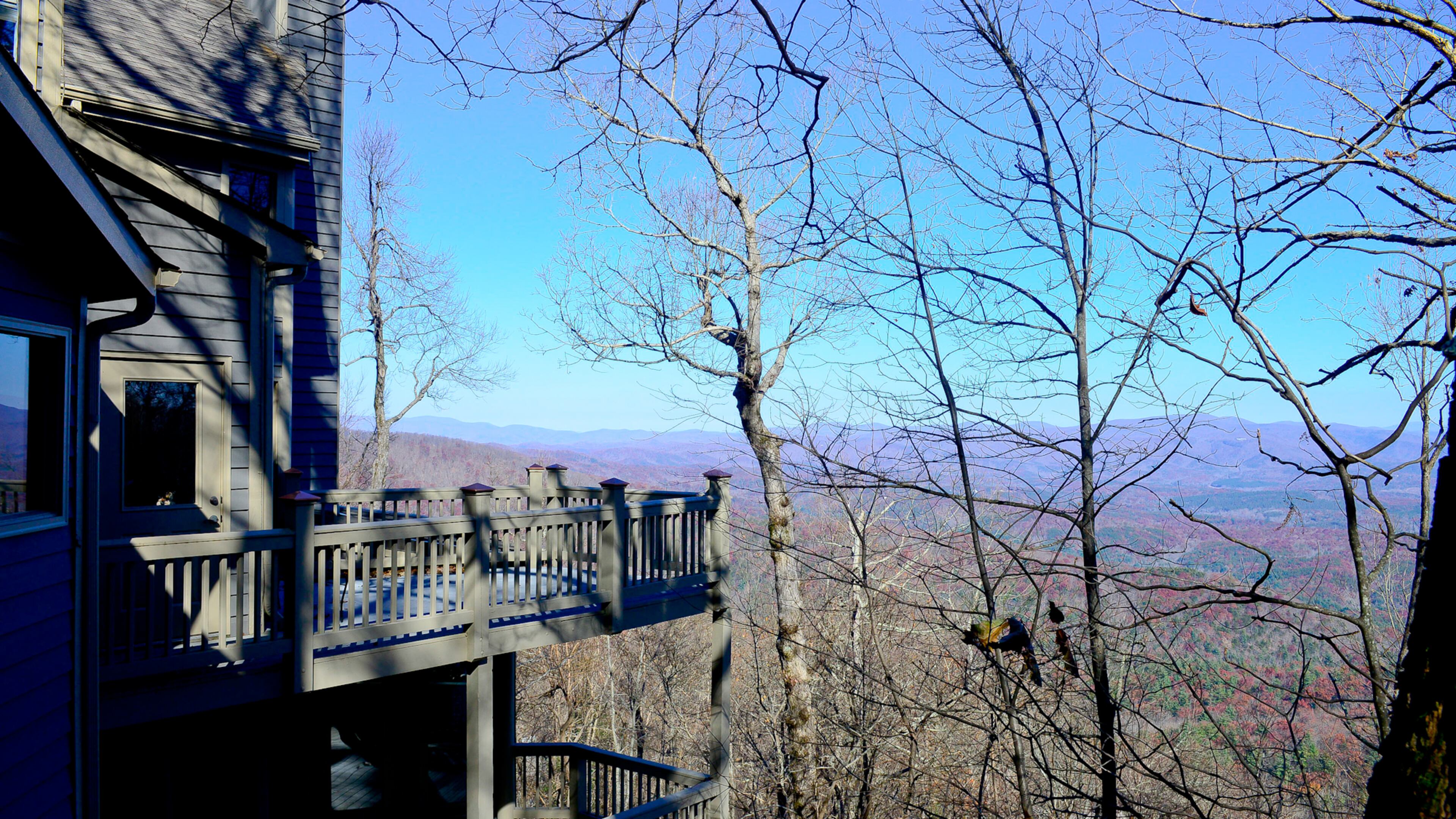 Two levels of decks nearly surround John and Andrea Pruitt's three-bedroom, three-bath home in Big Canoe. They increased the size of the decks in a renovation after buying the home in 2003.