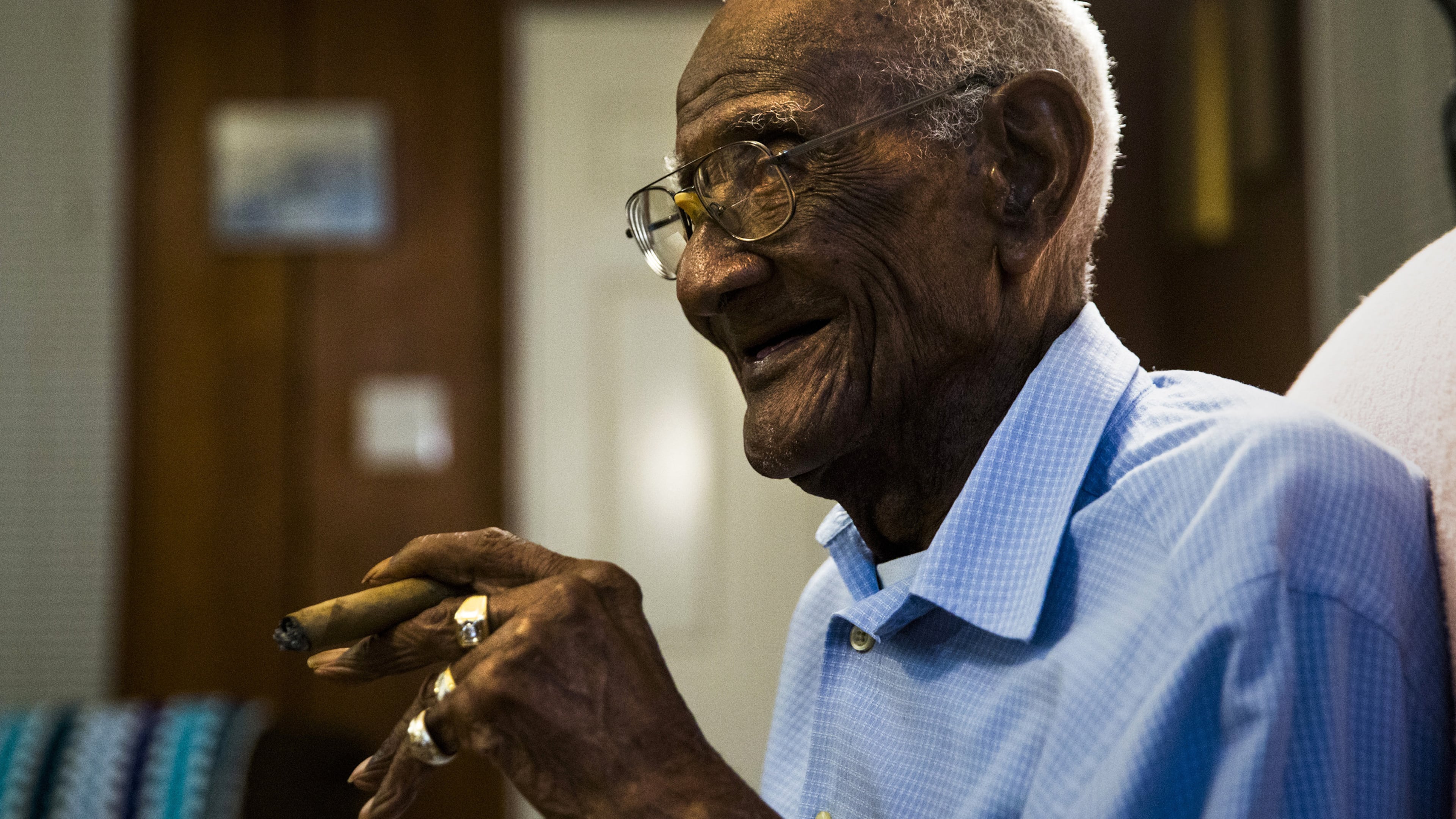 U.S. Army veteran Richard Overton sits in his chair smoking a cigar at 4:54 a.m. on Saturday, May 5, 2018 at his home in Austin, Texas. Mr. Overton turned 112 on May 11. He rises some time between 3 and 5 a.m. and smokes about 15 cigars a day. (Ashley Landis/Dallas Morning News/TNS)
