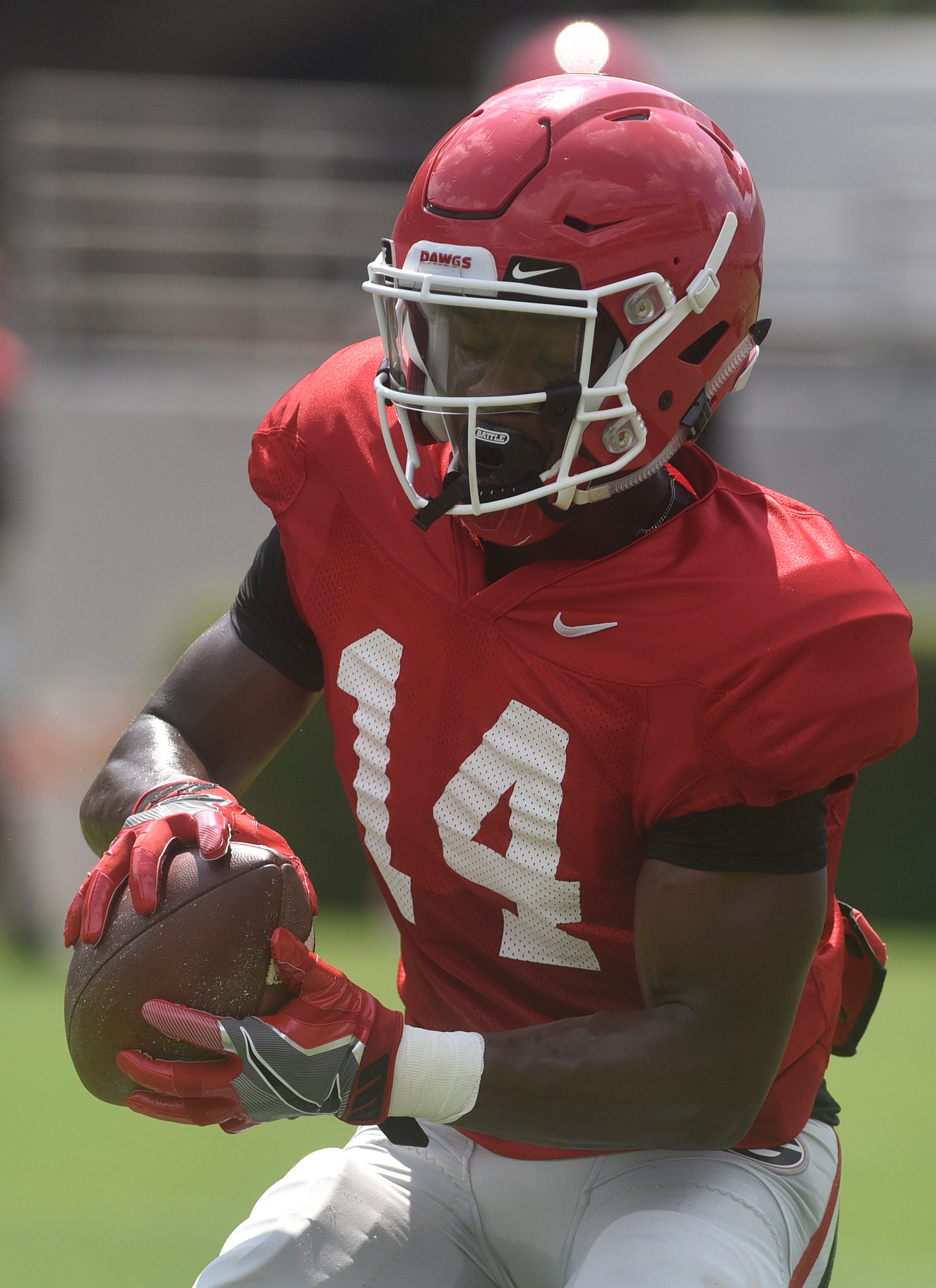 Georgia corner back Malkom Parrish (14) catches a pass during drills at an open practice during the annual UGA Fan Day at Sanford Stadium on Saturday, Aug 5, 2017 in Athens, Ga.
(RICHARD HAMM)