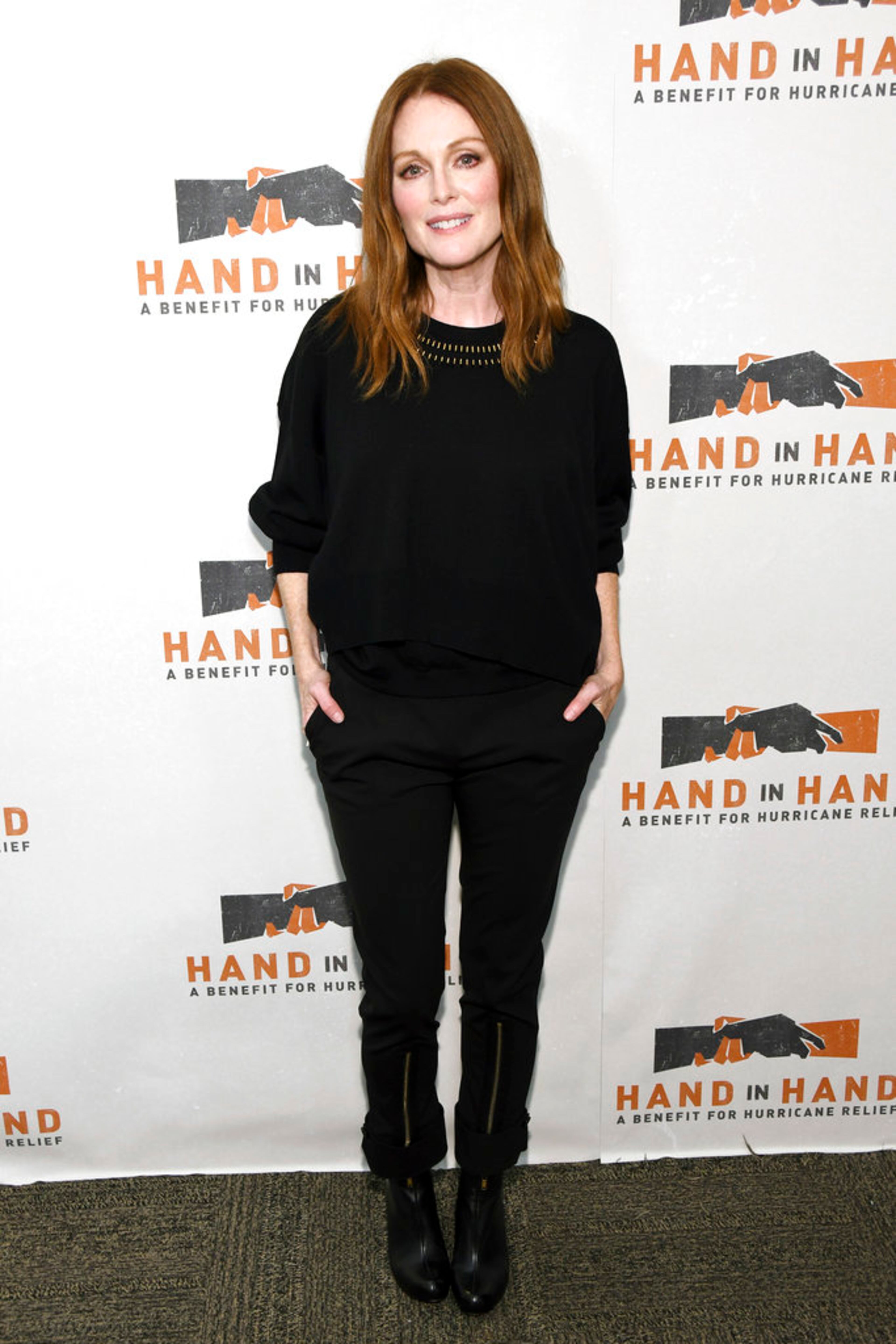 Julianne Moore attends Hand in Hand: A Benefit for Hurricane Harvey Relief at ABC Studios on Tuesday, Sept. 12, 2017 in New York. (Photo by Charles Sykes/Invision/AP)