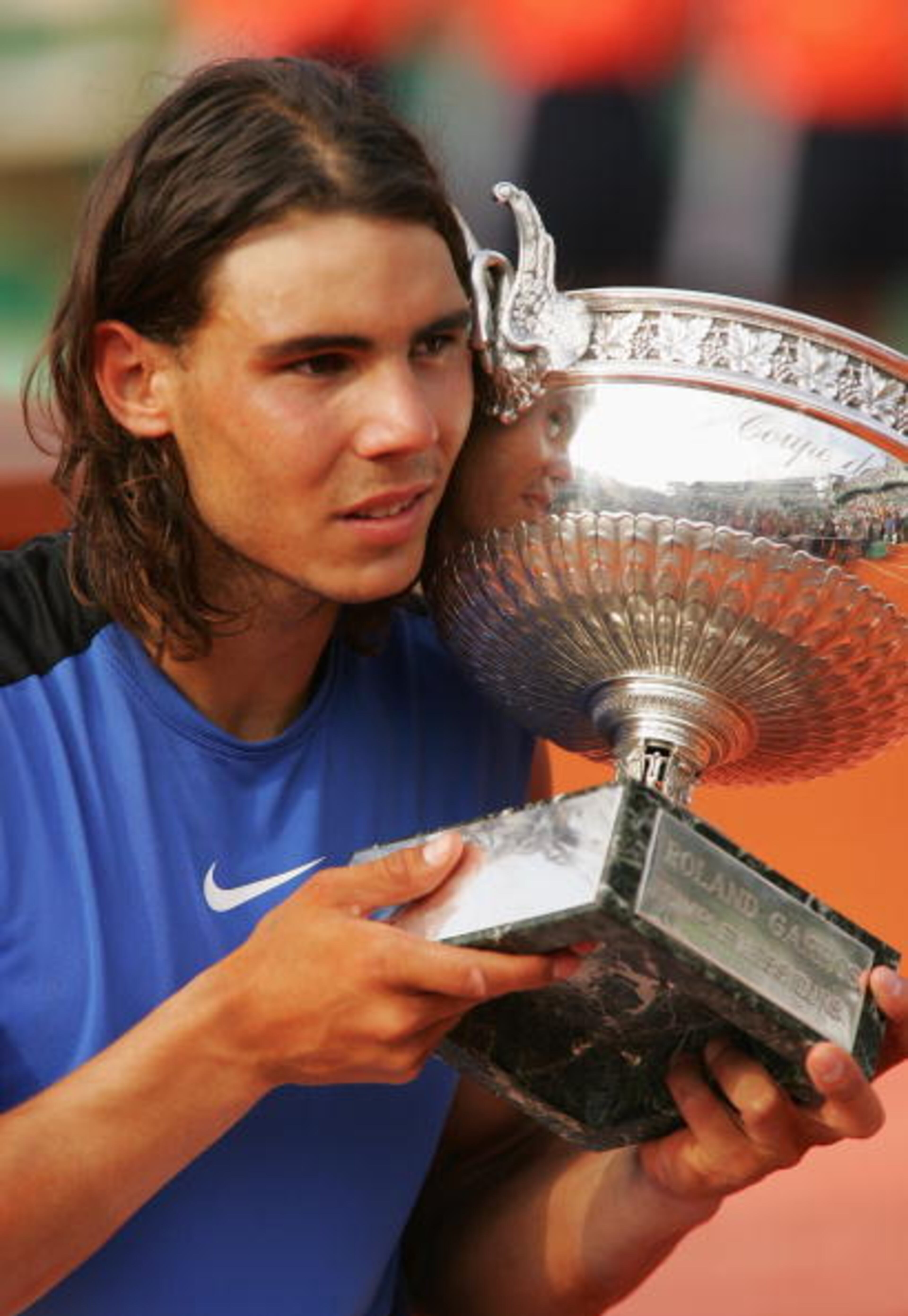 2006: Nadal beats Roger Federer 1–6, 6–1, 6–4, 7–6 (7–4).