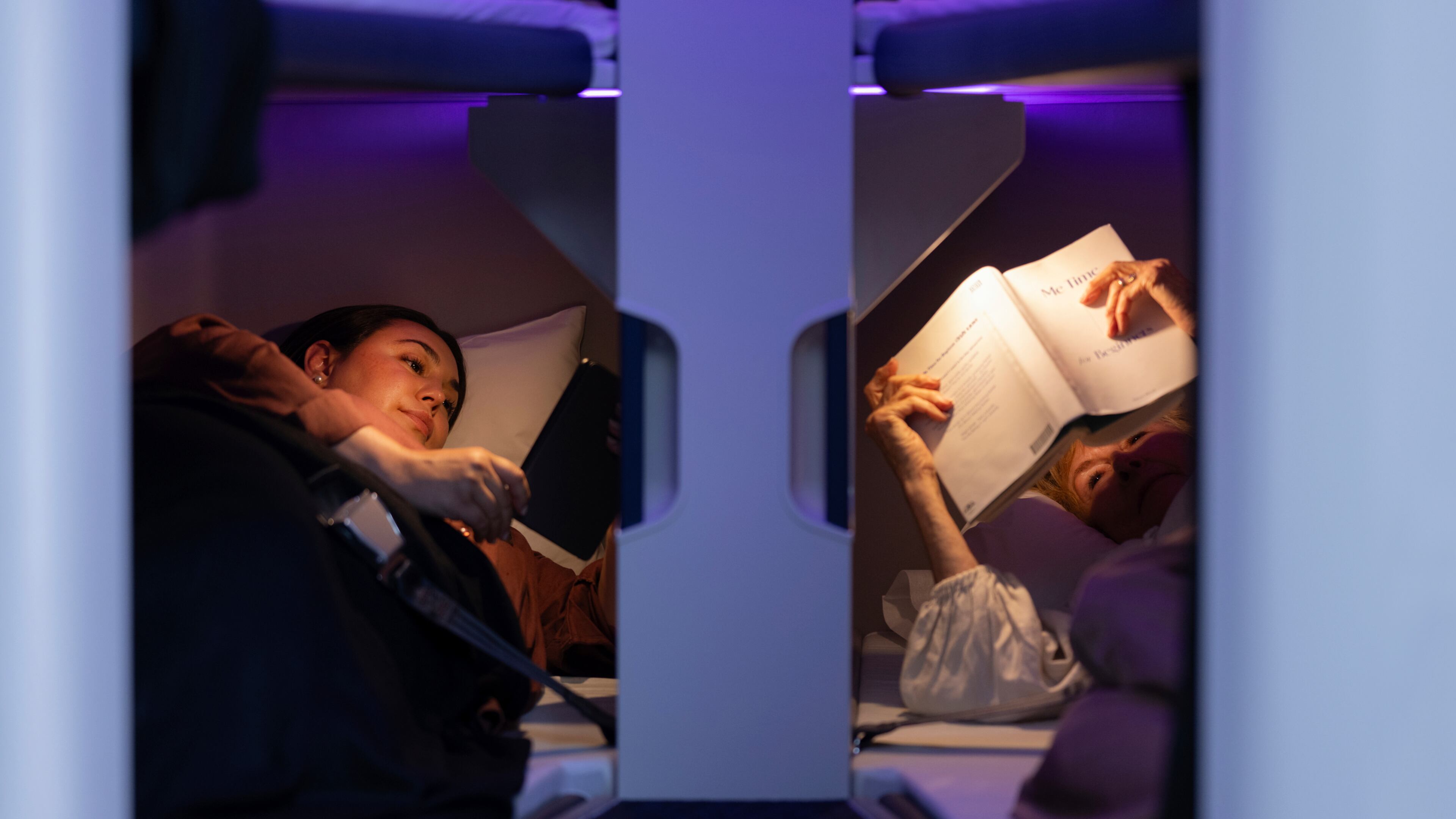 This photo provided by Air New Zealand shows sleeping pods in a mock-up of a plane cabin in Auckland, New Zealand. (Air New Zealand via AP)