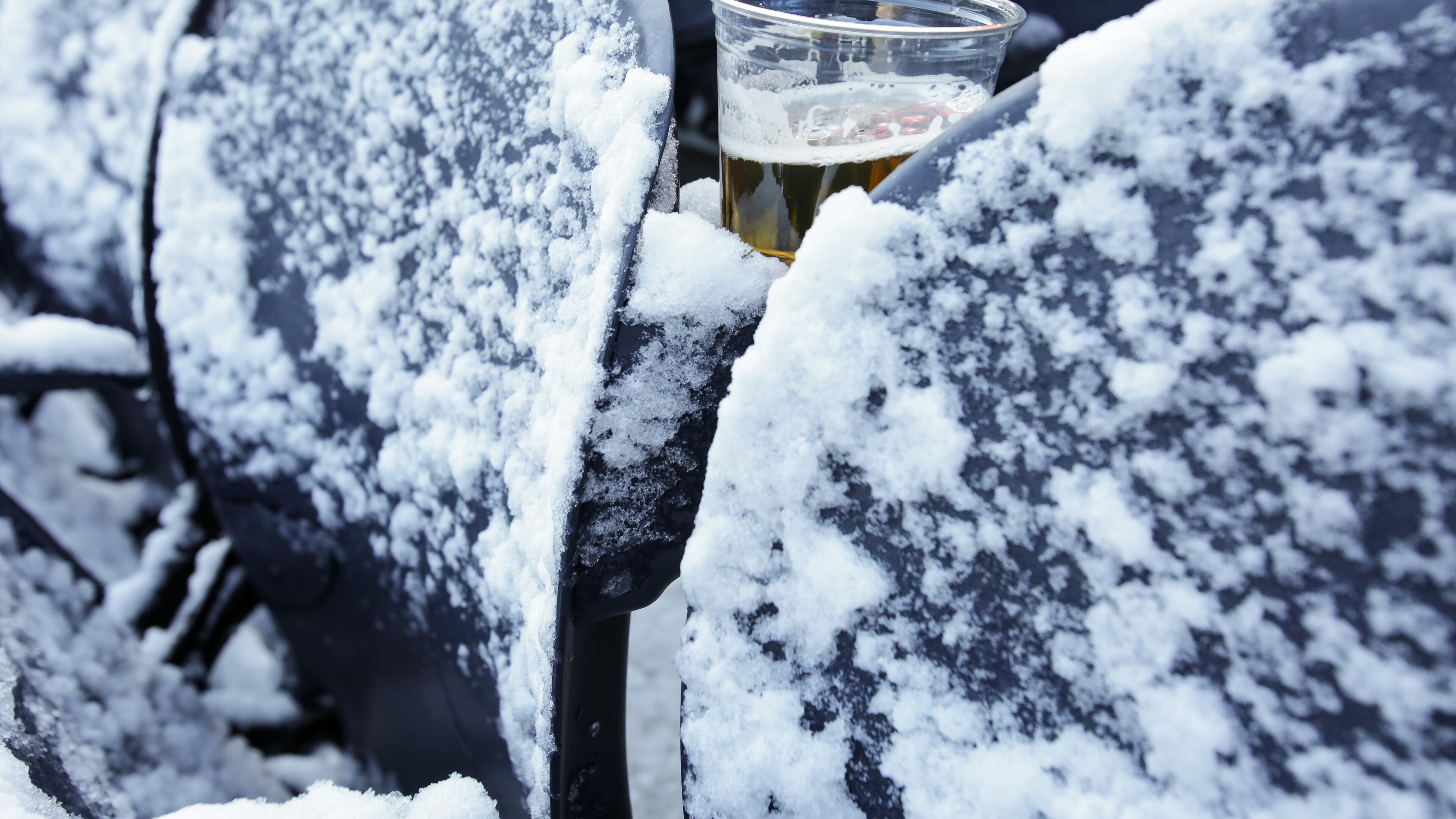 CHICAGO, IL - NOVEMBER 22: A beer sits between snow covered seats prior to the NFL game between the Chicago Bears and the Denver Broncos at Soldier Field on November 22, 2015 in Chicago, Illinois. (Photo by Kena Krutsinger/Getty Images)
