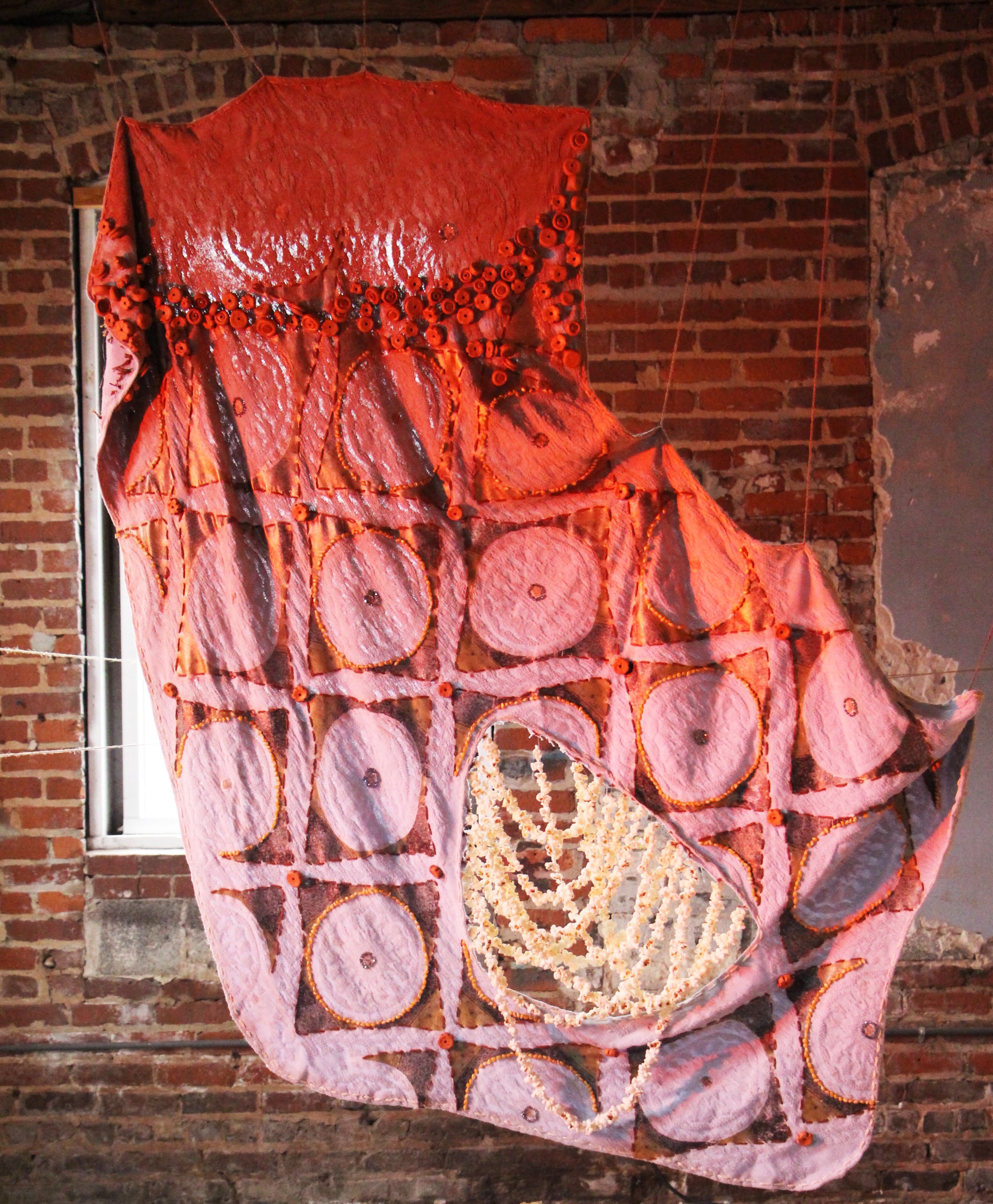 Performative Object #2, 2019
Stretched found fabric, Bahia Popcorn Photo Gel Medium Transfer, Hand Sewing, Popcorn Kernels, Hand Strung Popcorn, Ceramic Beads, Smells of Buttered Popcorn. Mitchell, an art professor at Spelman College is one of the fellows in MOCA GA's Working Artists Project 2020/2021