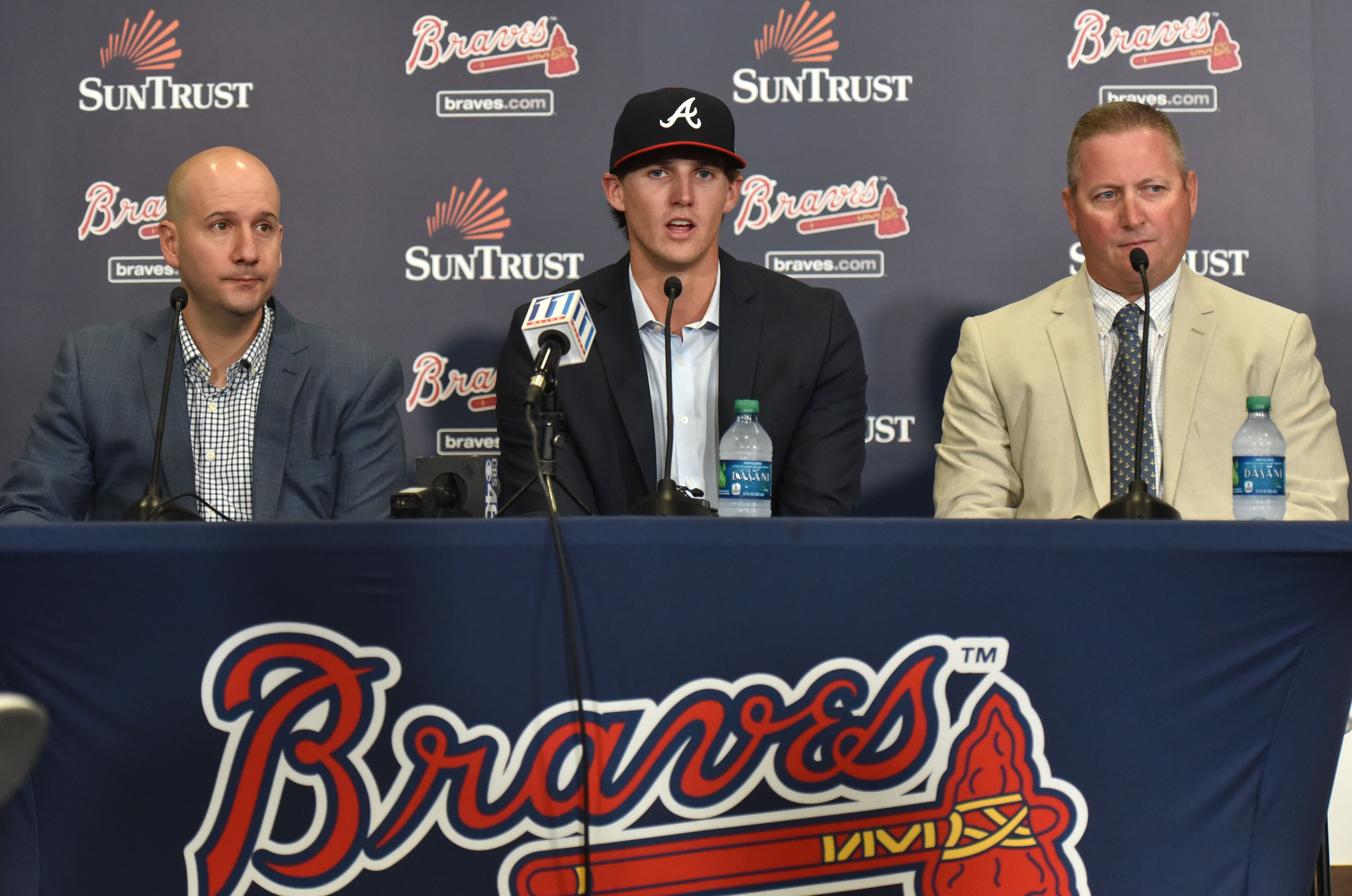 June 16, 2017 Atlanta - Kyle Wright (center) speaks as General Manager John Coppolella (left) and Braves scouting director Brian Bridges sit next him during a press conference at SunTrust Park on Friday, June 16, 2017. The Atlanta Braves today agreed to terms with RHP Kyle Wright, the club's first-round selection in the 2017 First-Year Player Draft. HYOSUB SHIN / HSHIN@AJC.COM