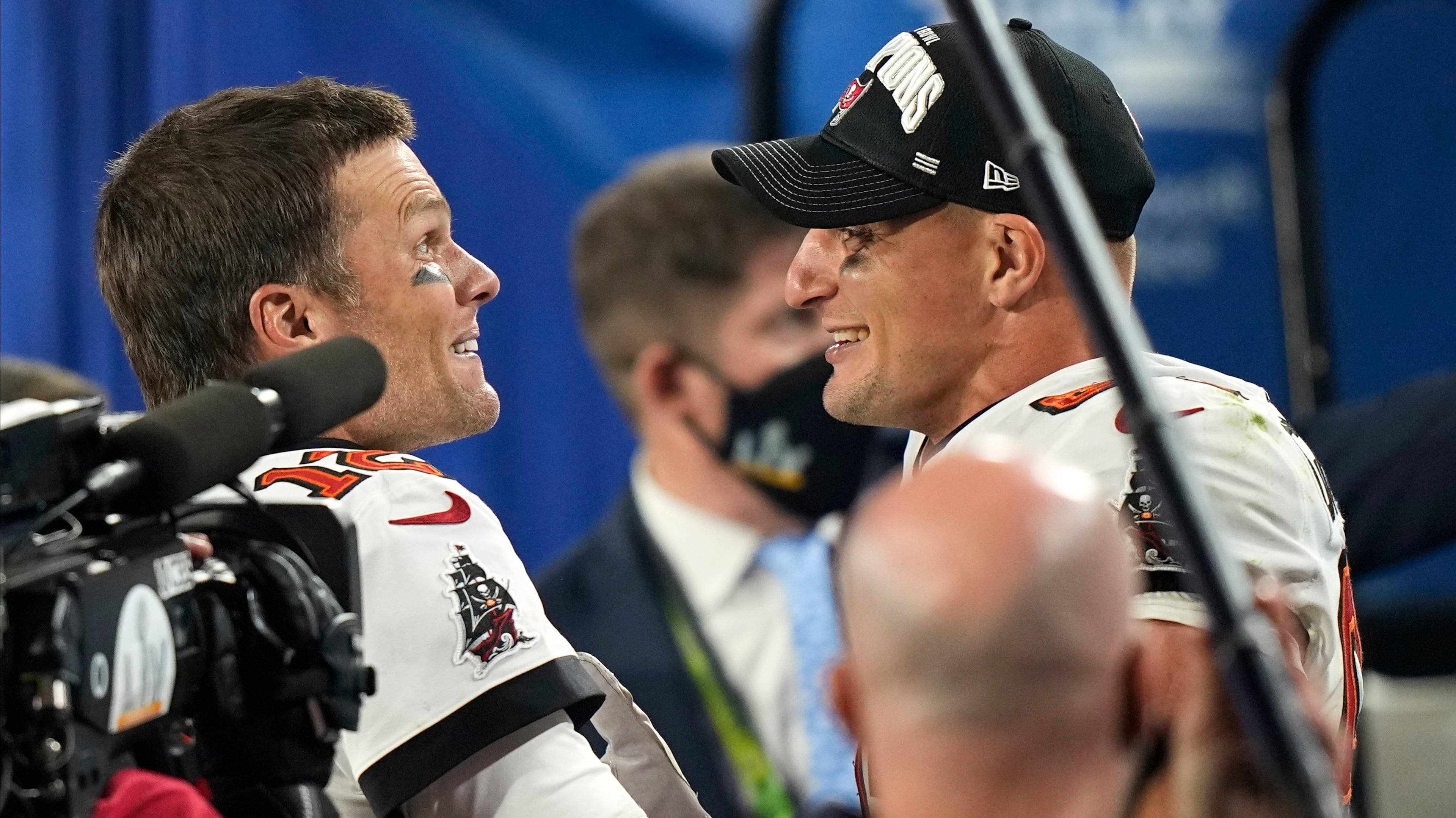 Tampa Bay Buccaneers quarterback Tom Brady and tight end Rob Gronkowski embrace after their 31-9 Super Bowl 55 win Sunday, Feb. 7, 2021, in Tampa, Fla. The pair have won four Super Bowl titles as teammates with the Bucs and New England Patriots. (David J. Phillip/AP)