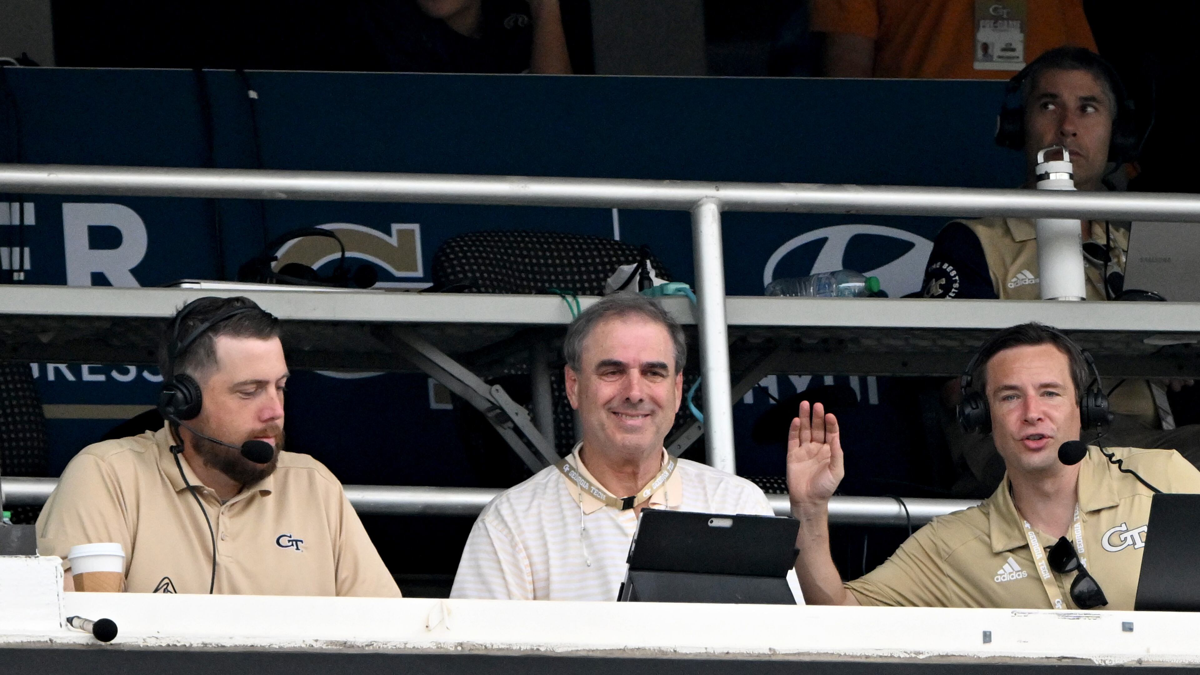 From left, analyst Andrew Gardner, Al Ciraldo Jr., and Tech voice Andy Demetra are shown on air for the Georgia Tech Sports Network during an NCAA college football game at Georgia Tech's Bobby Dodd Stadium, Saturday, September 6, 2025, in Atlanta. Georgia Tech won 59-12 over Gardner-Webb. (Hyosub Shin / AJC)
