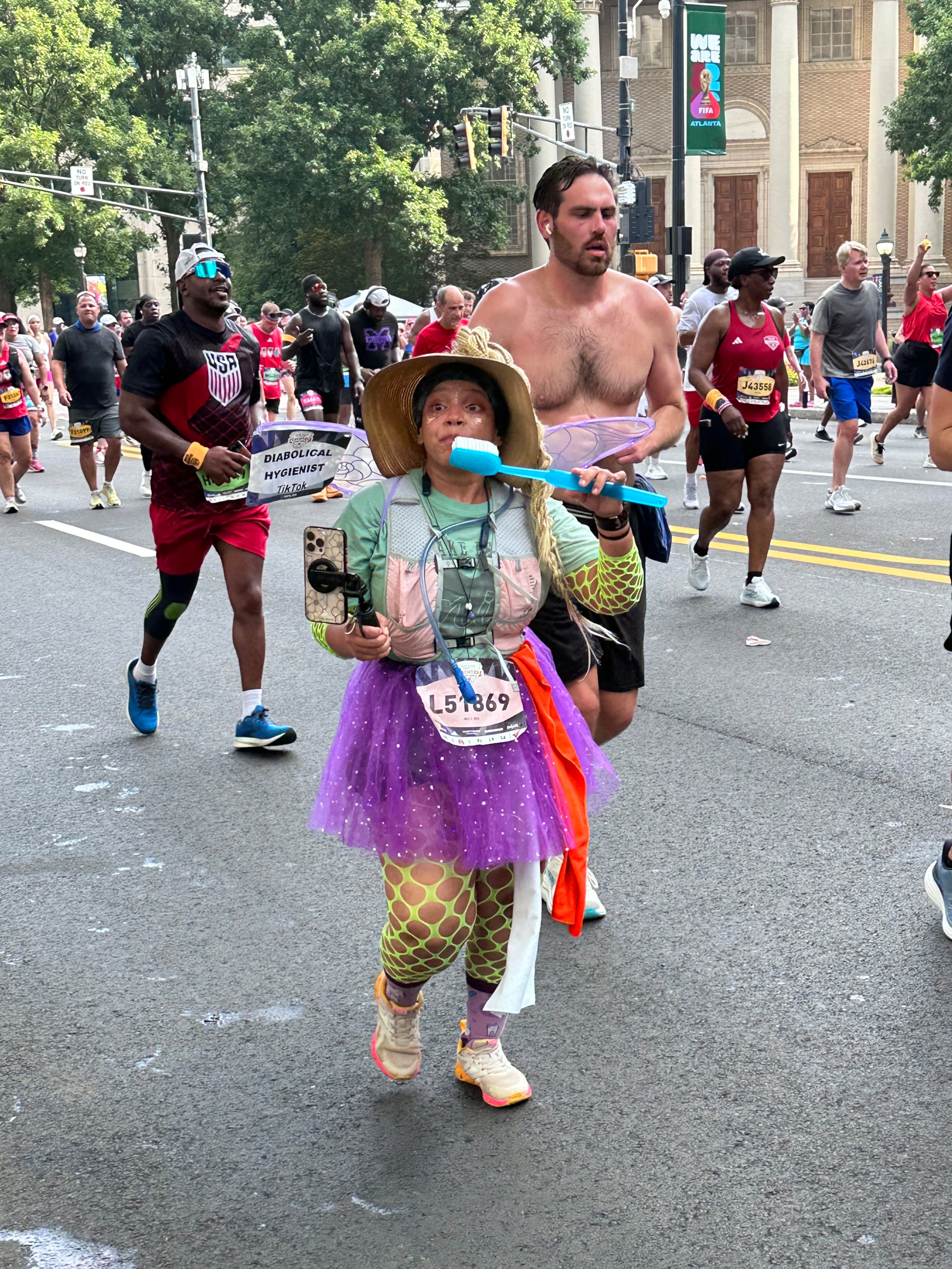 Our entertainment reporter, Rodney Ho, got a quick shot of the Tooth Fairy as she passed in front of the AJC HQ on Peachtree St.