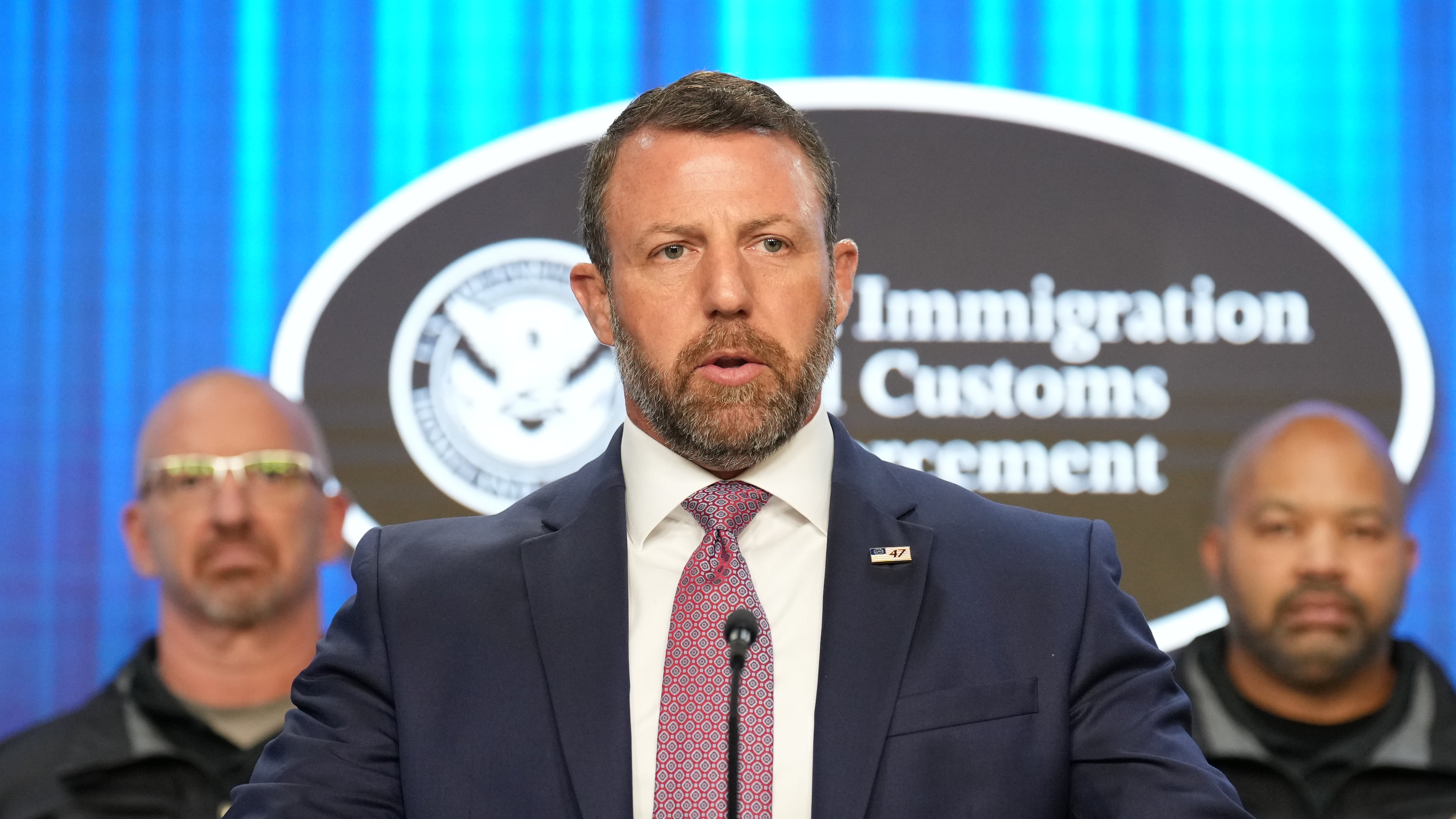 Secretary of Homeland Security Markwayne Mullin, with Immigration and Customs Enforcement (ICE) officials, speaks during a news conference at ICE Headquarters, Friday, Oct. 9, 2026, in Washington. (AP Photo/Jacquelyn Martin)