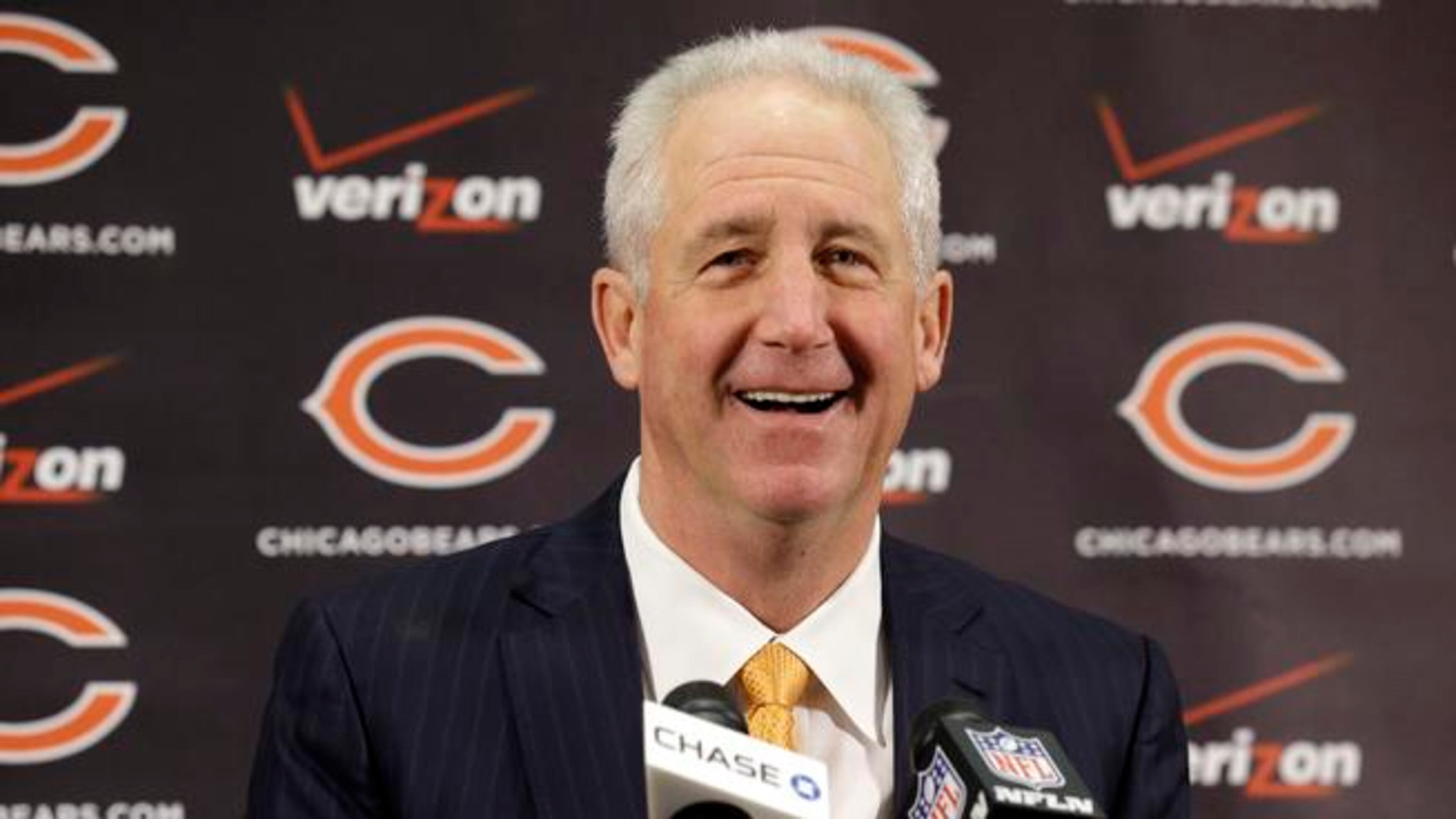 FILE - In this Monday, Jan. 19, 2015, file photo, Chicago Bears new head coach John Fox smiles as he speaks at an NFL football news conference at Halas Hall in Lake Forest, Ill. Fox was fired despite leading the Denver Broncos to the playoffs and had a job two days later with Chicago. (AP Photo/Nam Y. Huh)