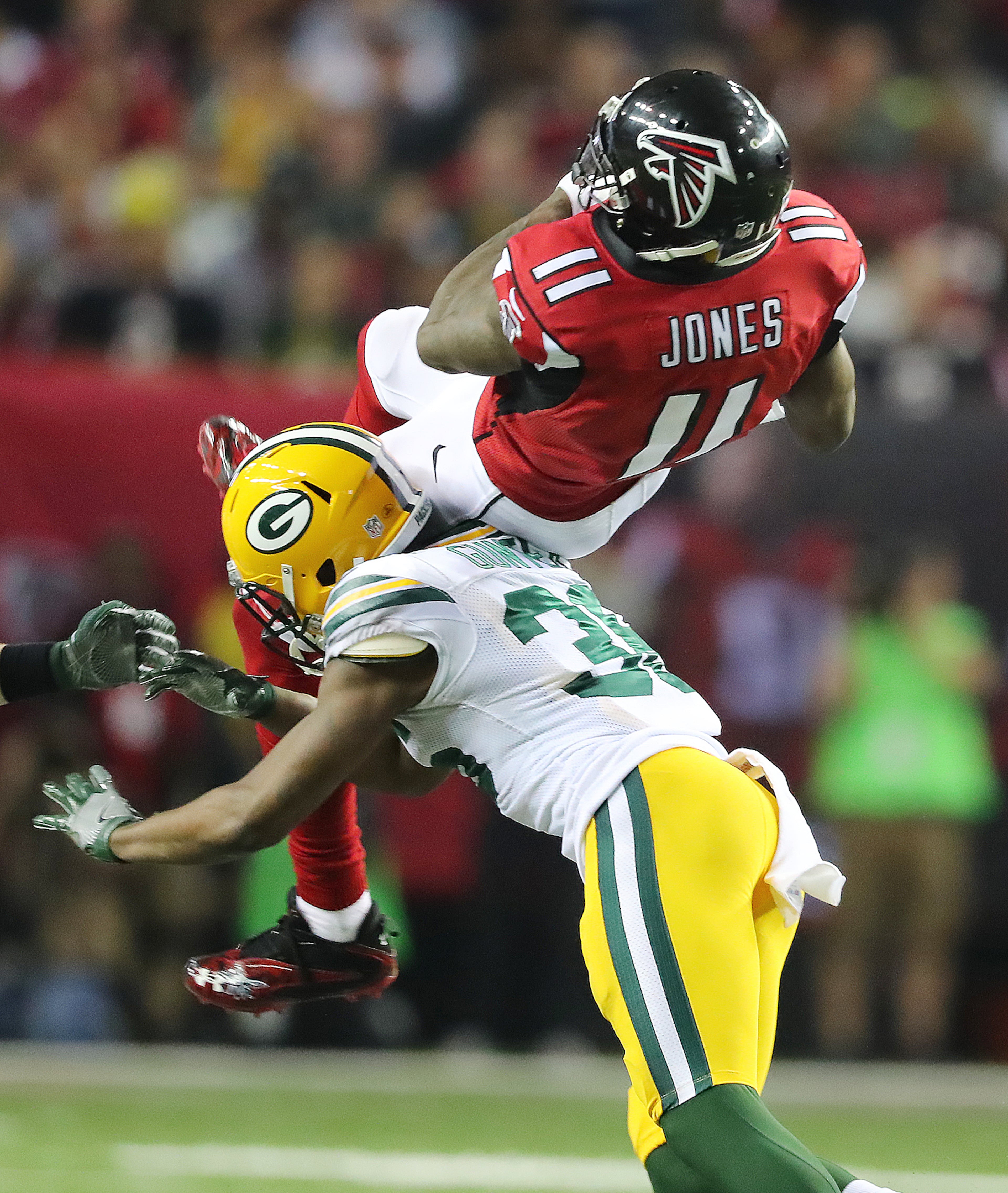 January 22, 2017, Atlanta: Falcons wide receiver Julio Jones makes a first down catch over Packers LaDarius Gunter during the second half in the NFL football NFC Championship game on Sunday, Jan. 22, 2017, in Atlanta. Curtis Compton/ccompton@ajc.com