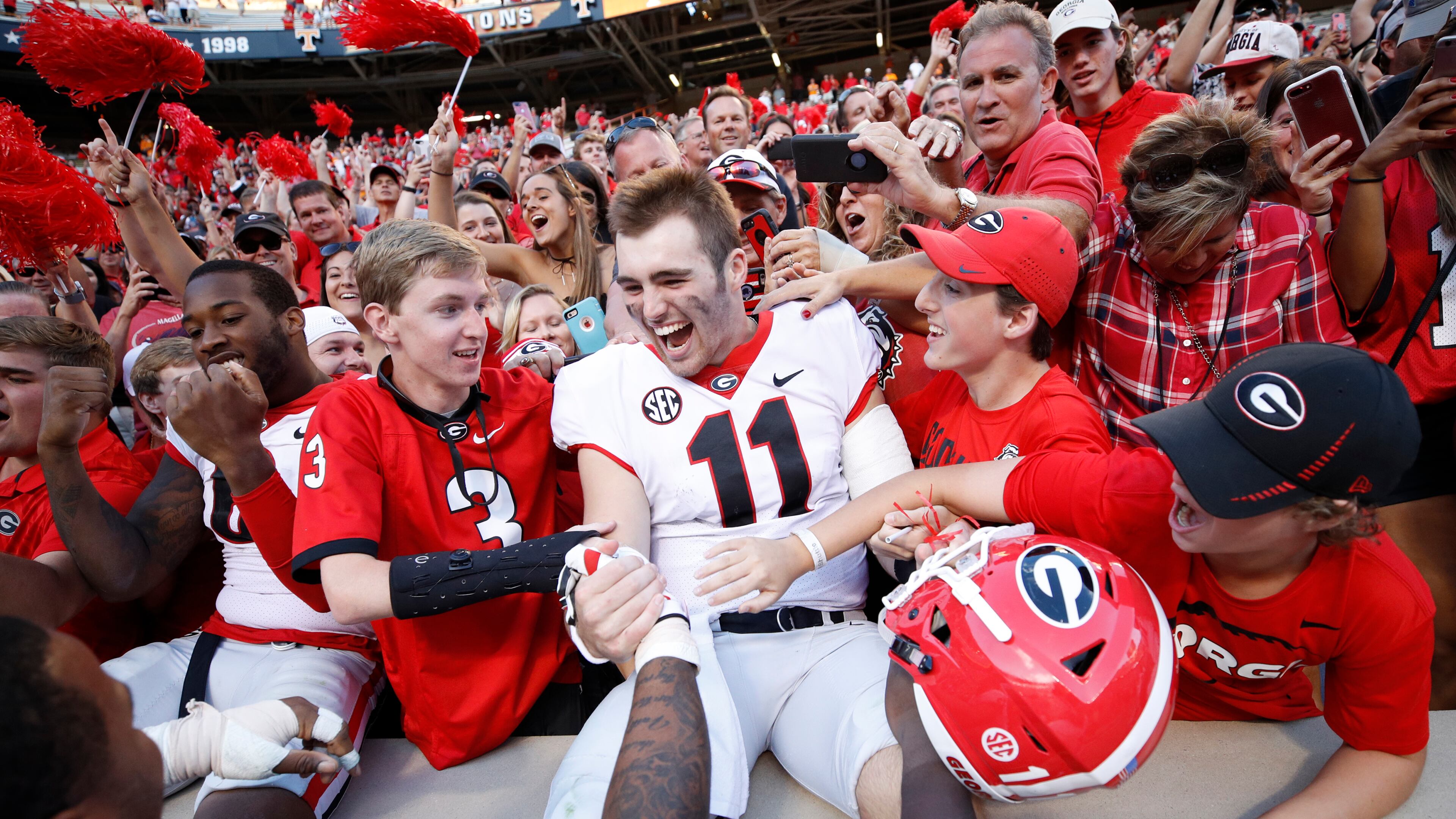 Bulldogs quarterback Jake Fromm is in the middle of a lot of celebrations these days - this one after beating Tennessee at Neyland Stadium. (Joe Robbins/Getty Images)