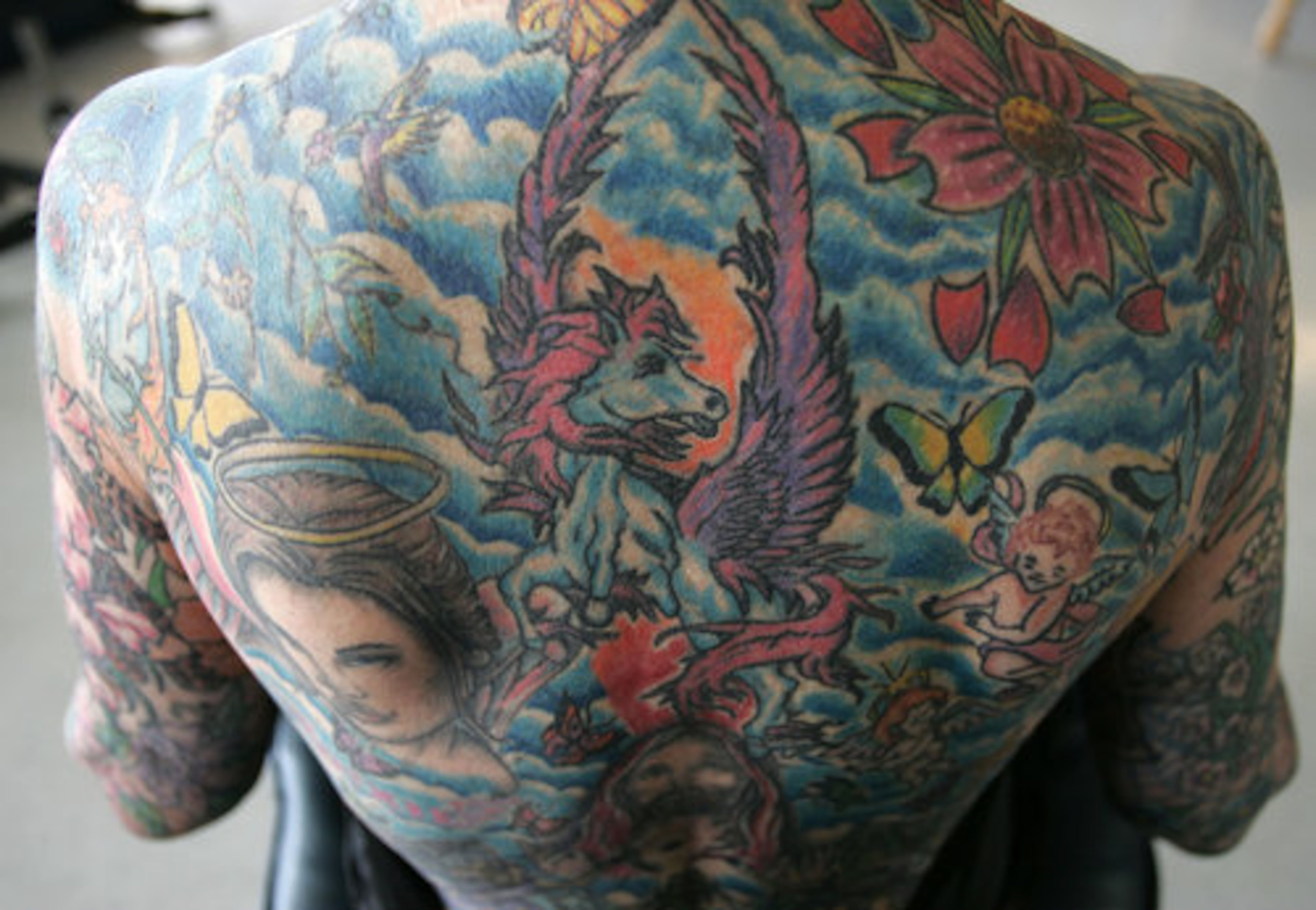 Shirley "Miss Dixie" Hammond shows some of her elaborate body art before getting yet another new tattoo at Tiger Moon Tattoo and Piercing in Dallas, Texas. Hammond, 62, says getting tattoos helps her cope with being manic-depressive and a survivor of two cancers.