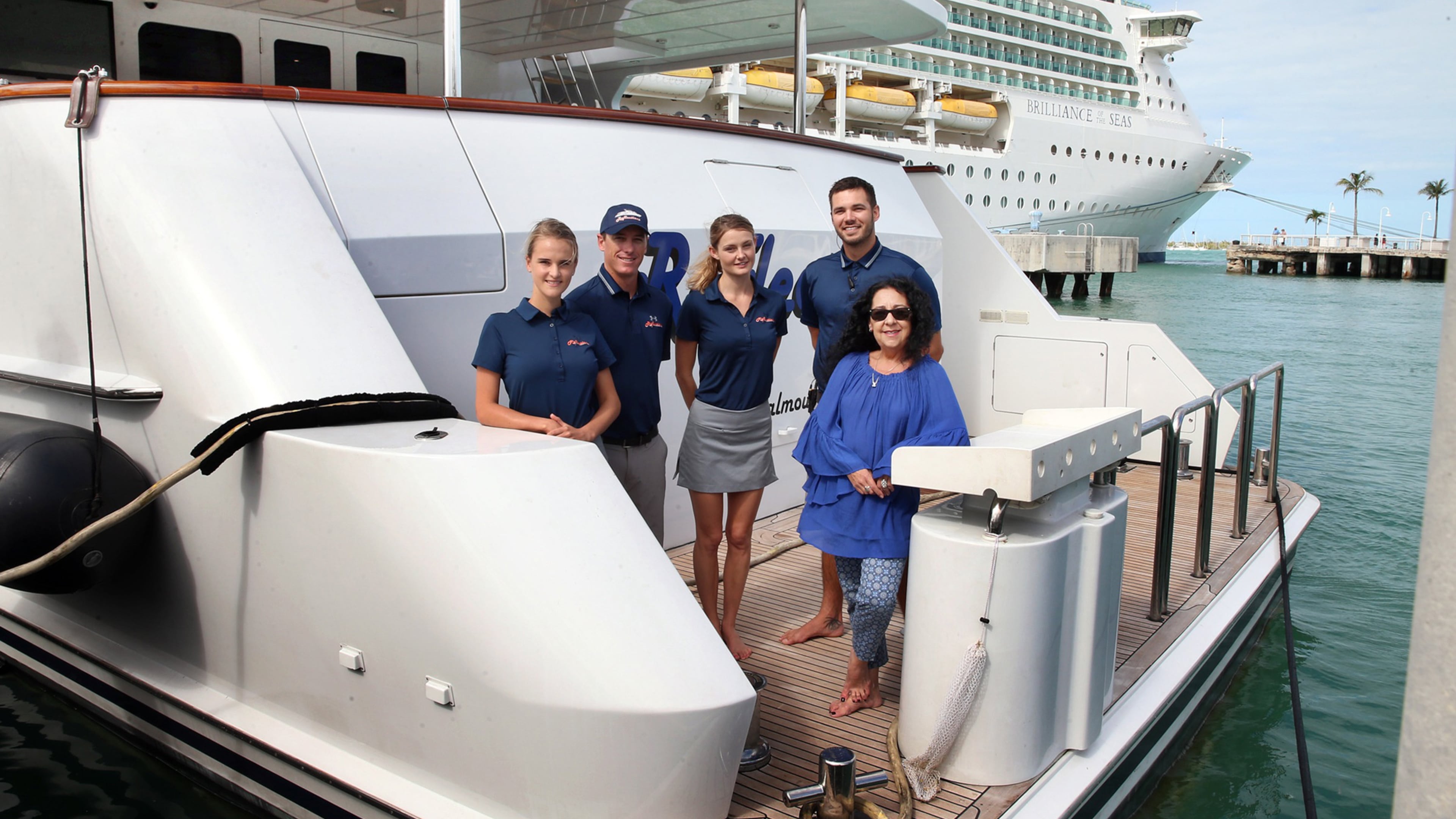 Maria Romeu, first from right, General Manager at Cuba VIP Yachts, joined the crew of the Reflections luxury yacht - anchored at Key West Marina, from left, stew Chloe Paul, first mate Clive Ranby, Chef Christy Dempster and Captain Zachary Ring, as they get the boat ready before heading to Cuba to meet a client who is flying to the island on Jan. 15, 2017. (Pedro Portal/Miami Herald/TNS)