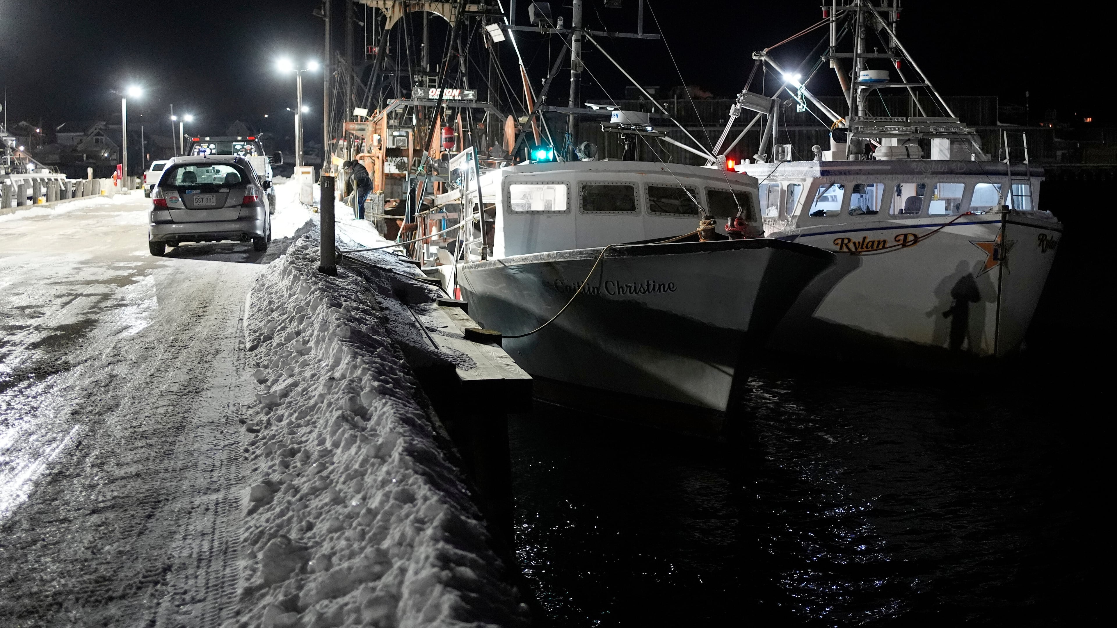 Fishing boats are tied up in Gloucester, Mass., the home port of a vessel that that went missing at sea with seven people aboard, Friday, Jan. 30, 2026. (AP Photo/Robert F. Bukaty)