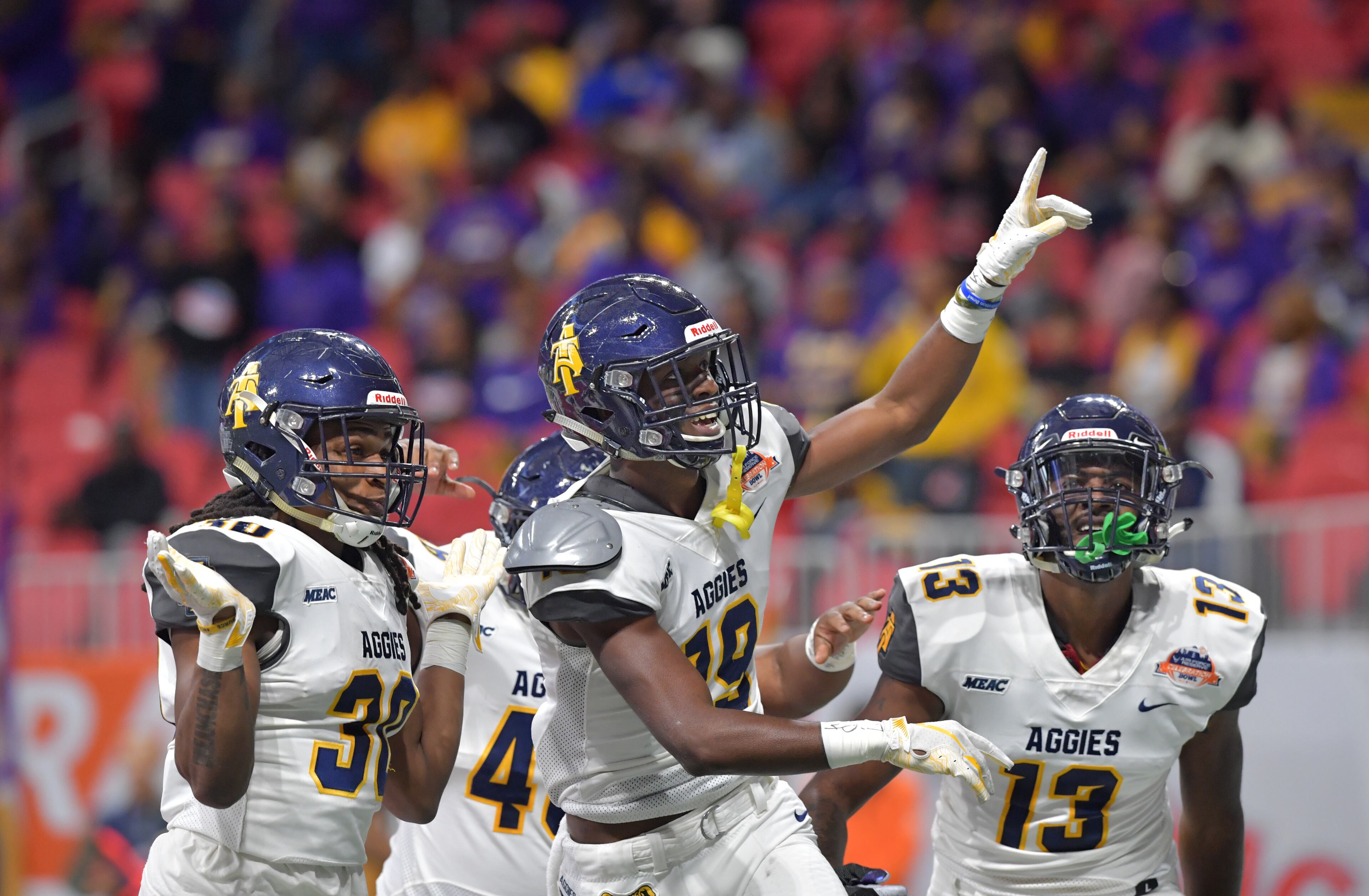 December 15, 2018 Atlanta - North Carolina A&T wide receiver Zachary Leslie (19) celebrates after he scored a touchdown during the first half of the 2018 Celebration Bowl at Mercedes-Benz Stadium on Saturday, December 15, 2018. HYOSUB SHIN / HSHIN@AJC.COM