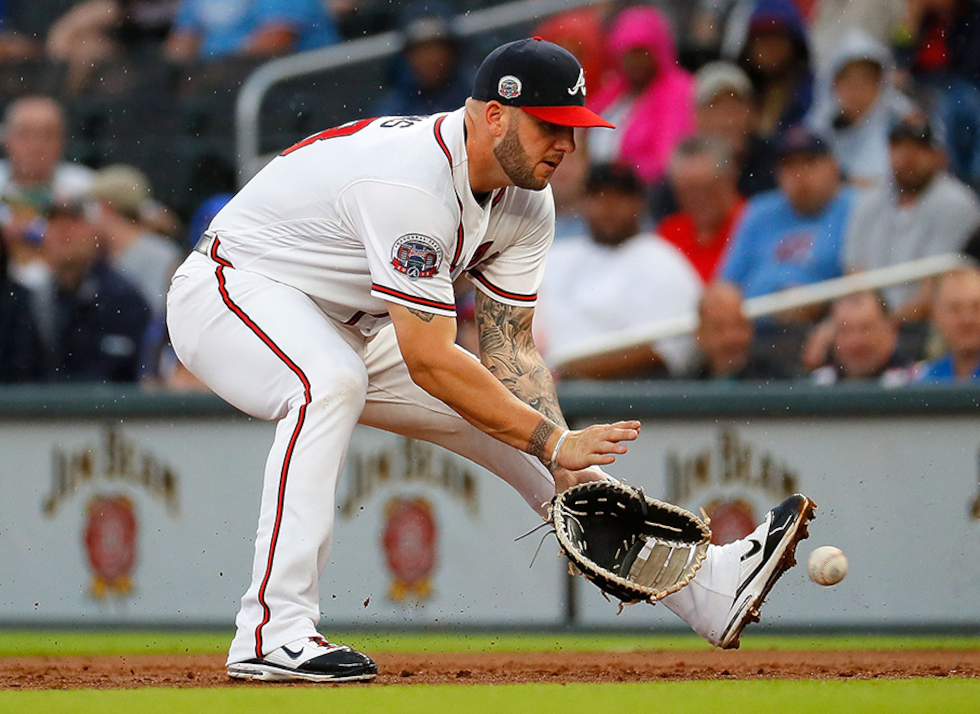 ATLANTA, GA - JUNE 05: Matt Adams #18 of the Atlanta Braves scoops up a ground out hit by Nick Pivetta #43 of the Philadelphia Phillies in the second inning at SunTrust Park on June 5, 2017 in Atlanta, Georgia. (Photo by Kevin C. Cox/Getty Images)