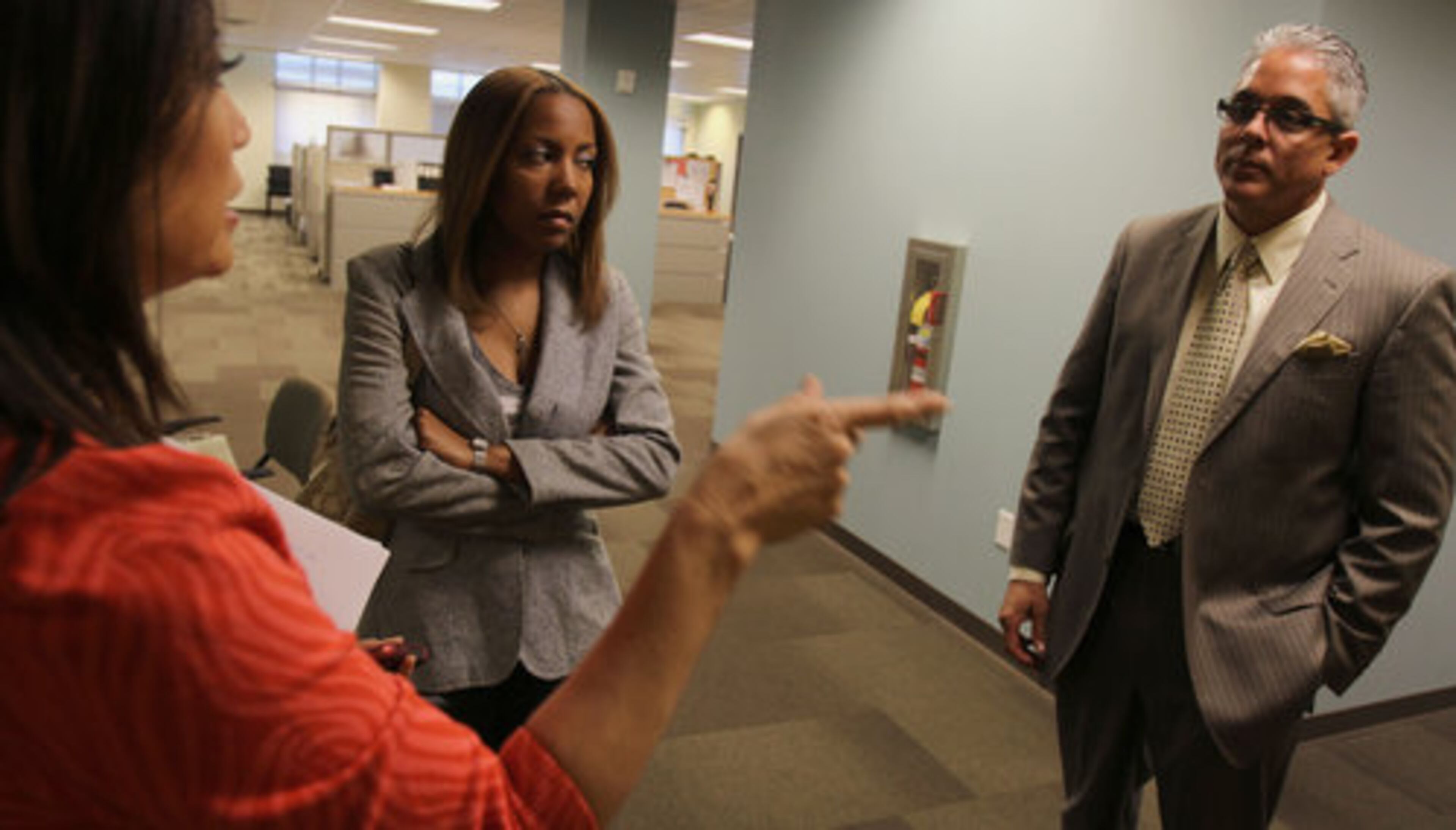 "America's Most Wanted" correspondent Angeline Hartmann goes through the next scene with Kessa Johnson, daughter of Atlanta Police Officer Alfred Johnson, and Atlanta Police Detective Vince Velazquez. Velazquez said this case was the last unsolved murder of an Atlanta police officer still open.