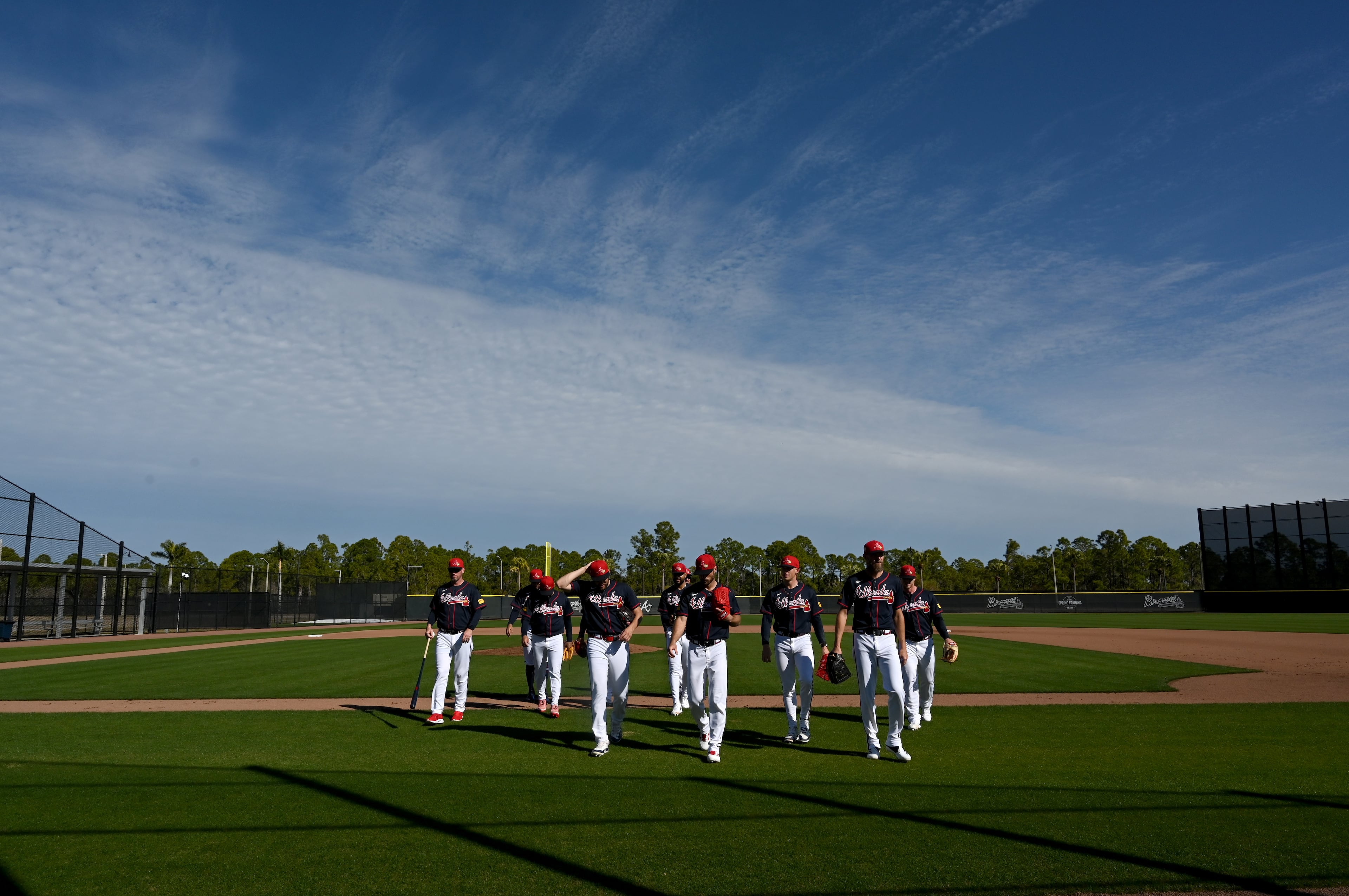 Braves pitchers leave a practice field during the second day of pitchers and catchers workouts Wednesday, Feb. 11, 2026, at CoolToday Park in North Port, Fla. (Hyosub Shin/AJC)