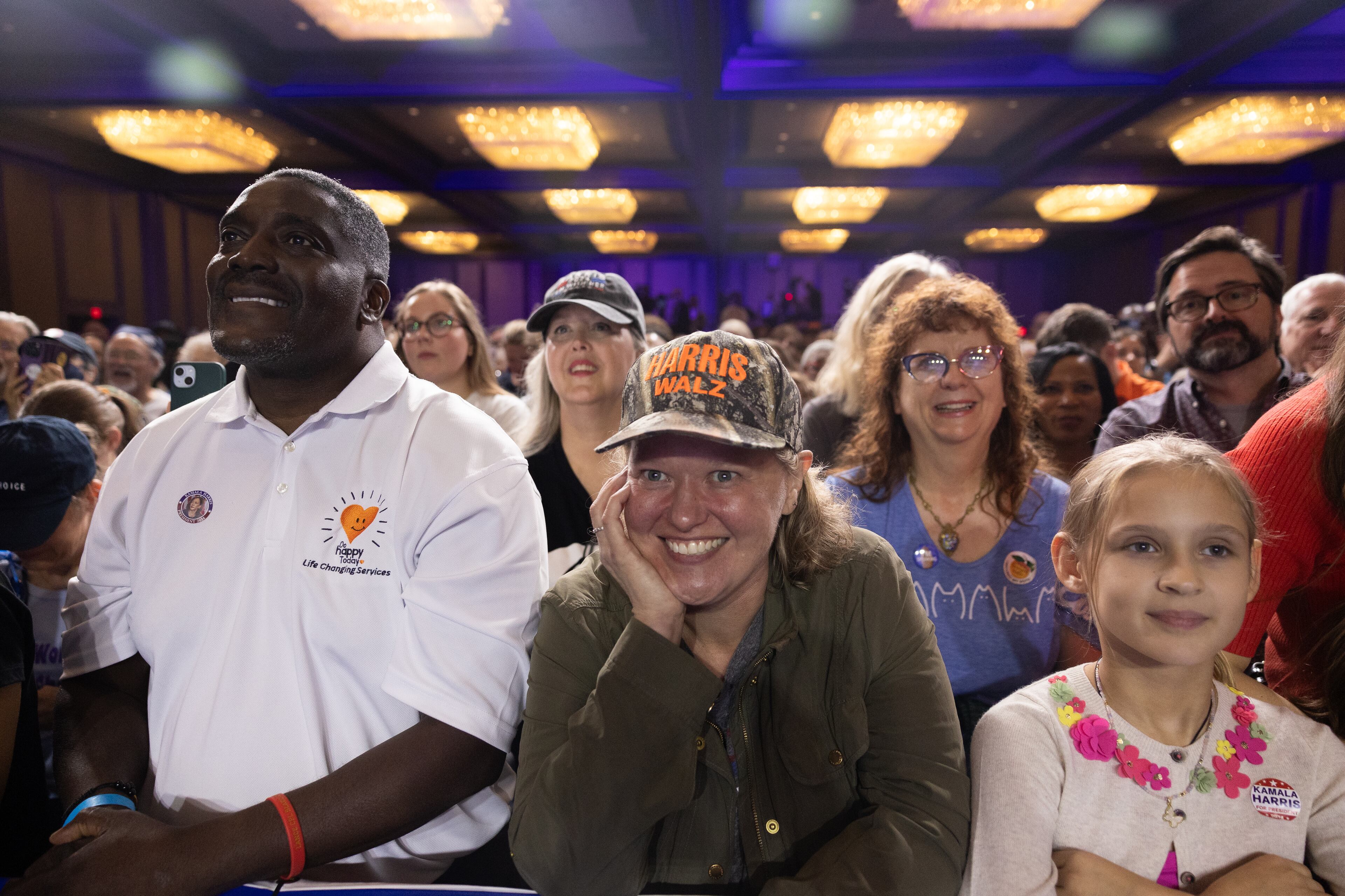 Supporters listen as Governor Tim Walz speaks at a campaign rally in Cobb County, Georgia on November 3, 2024. (Nathan Posner for the Atlanta Journal-Constitution)