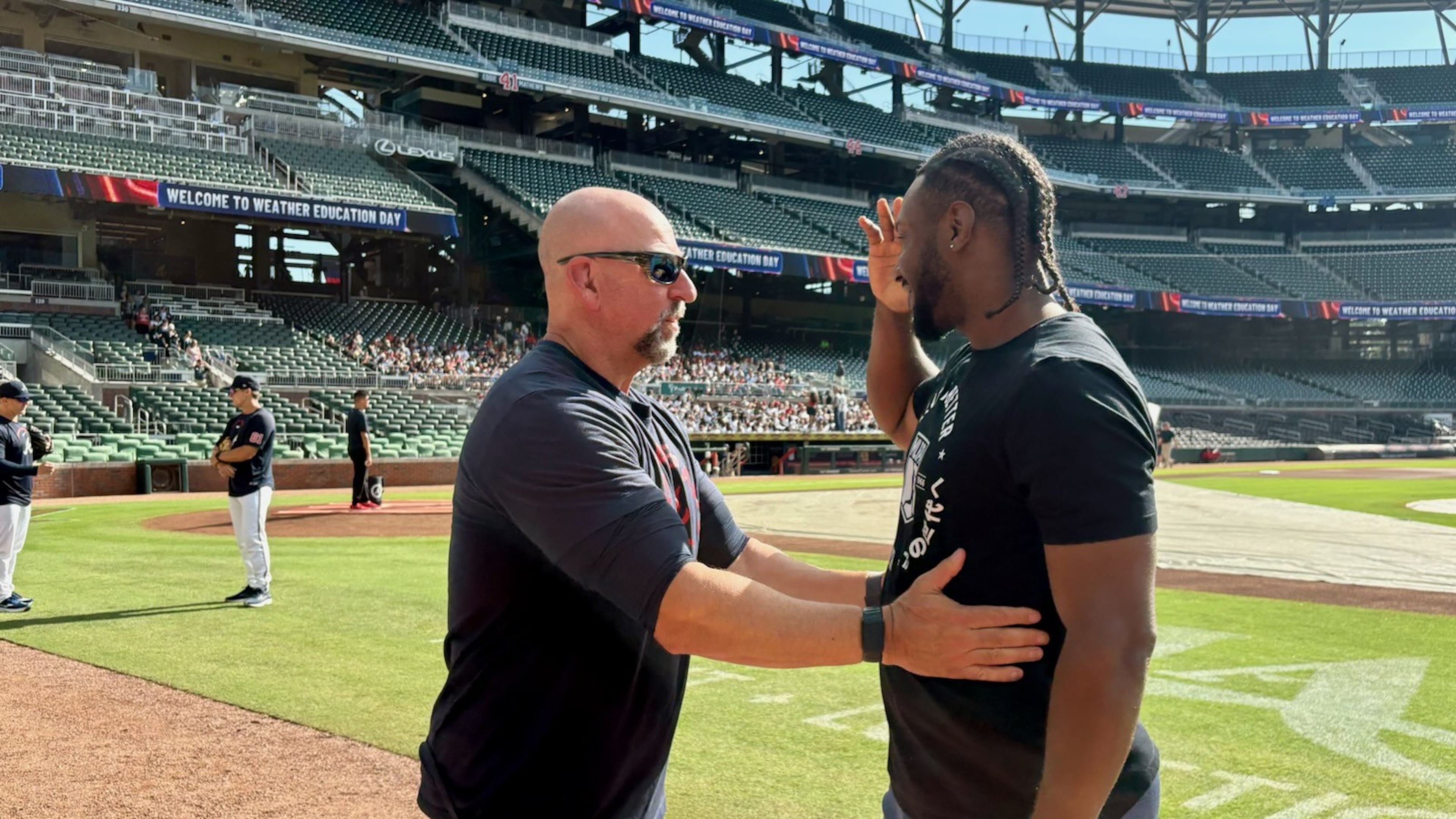 Braves manager Walt Weiss (left) and Rays infielder Jorge Mateo share a conversation before the Braves-Rays game Thursday, Sept. 10, 2026, at Truist Park. Atlanta cut Mateo in August when Ha-Seong Kim came off the injured list, and Mateo signed with Tampa Bay four days later. (Ken Sugiura/AJC)