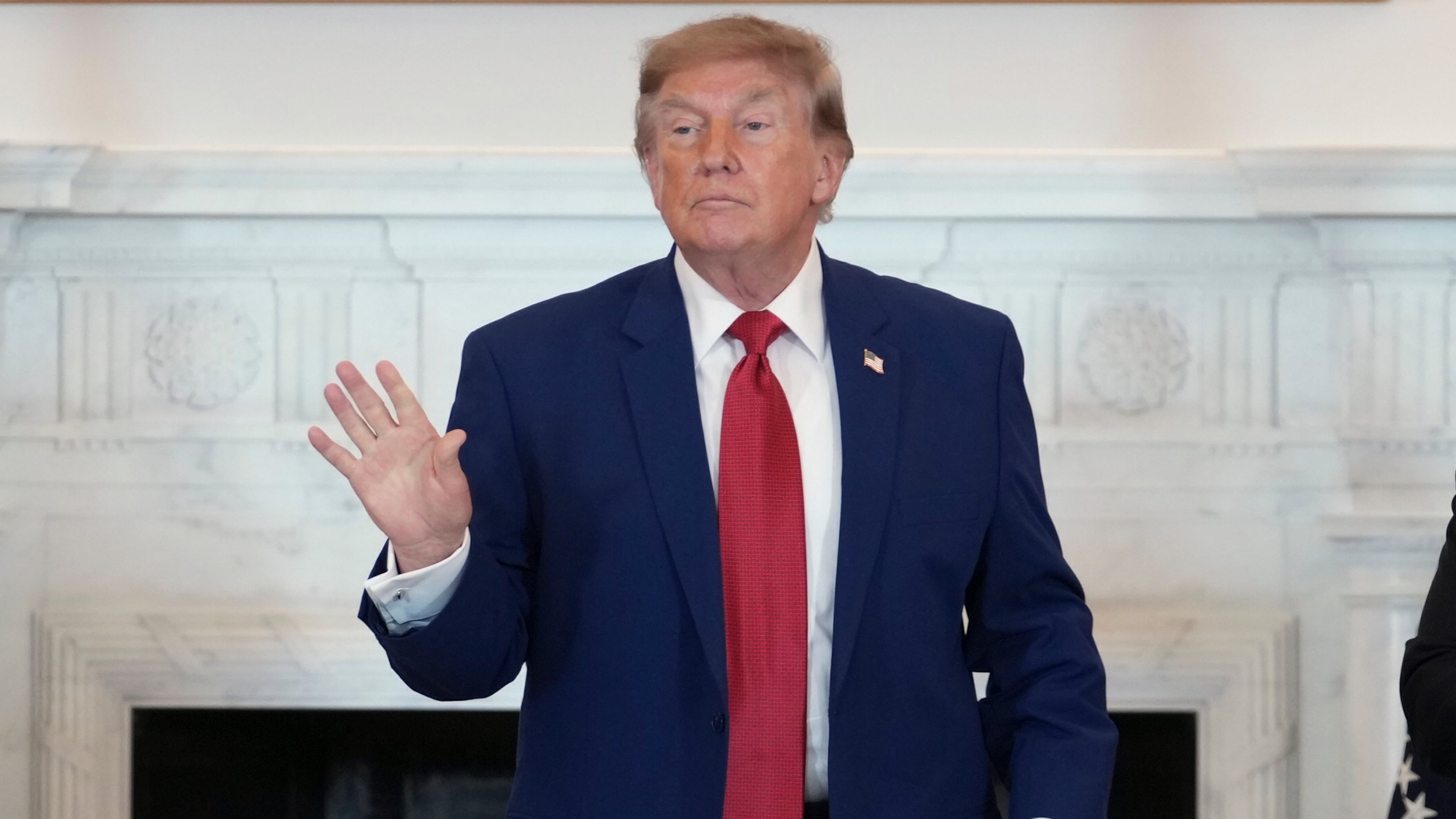 President Donald Trump departs after speaking at a roundtable on American mining, Friday, Aug. 7, 2026, at the State Department in Washington. (AP Photo/Allison Robbert)