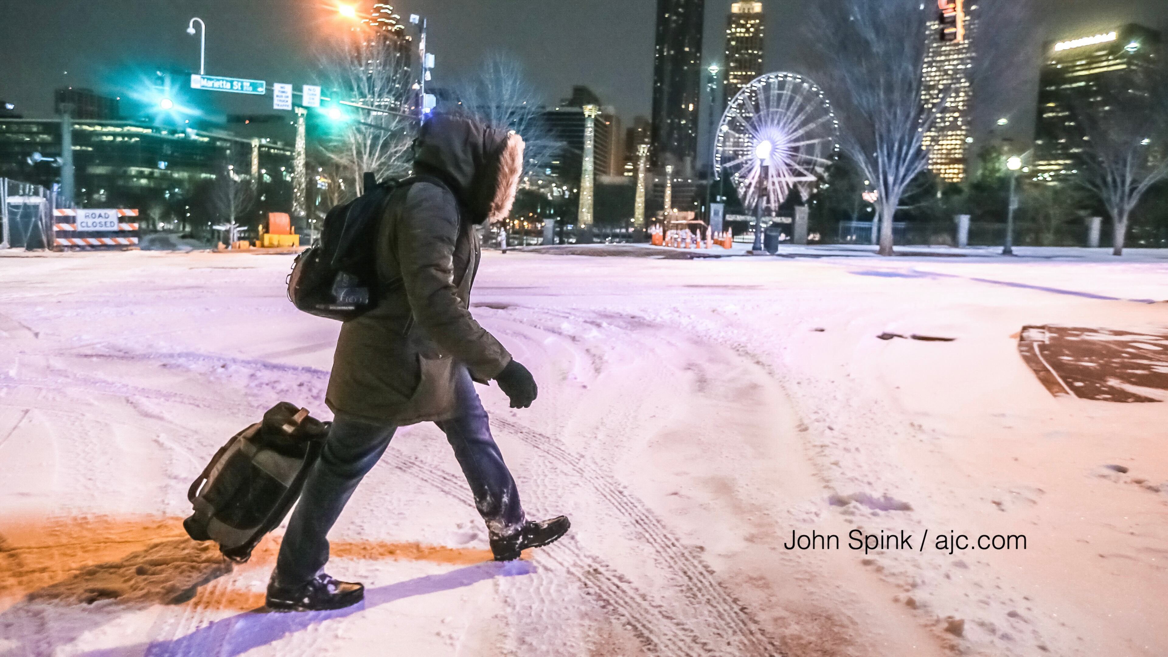 Zy Powell Walks along Marietta Street in downtown Atlanta.