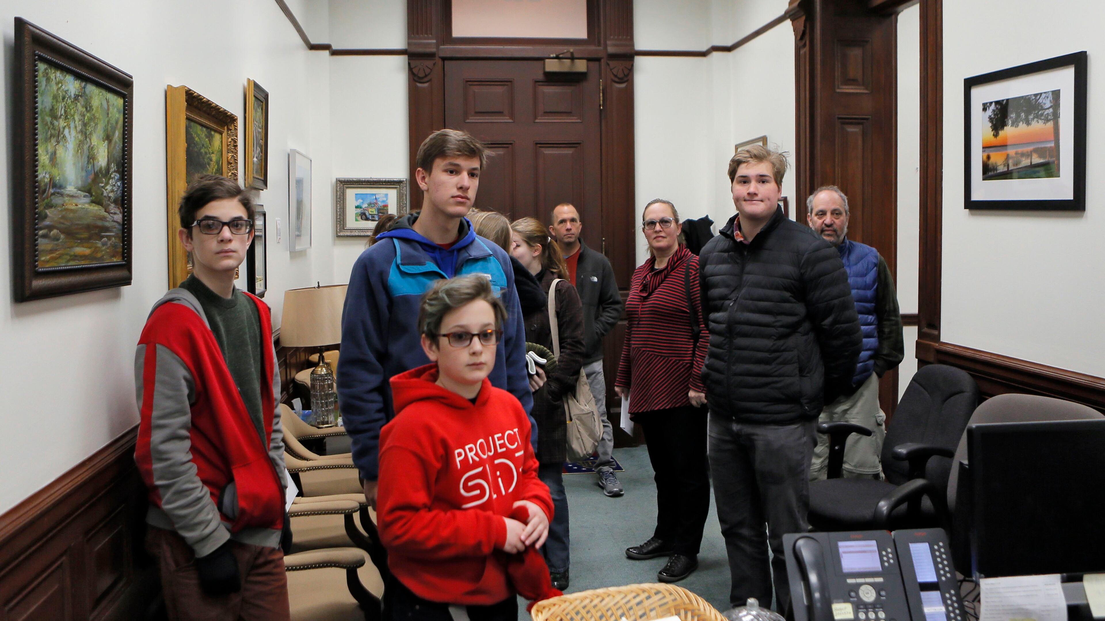 Students from the Vedado Way wait in the reception area of the office of state Rep. Earl Ehrhart, R-Powder Springs, to deliver a letter after they participated in a rally in protest of gun violence in Liberty Plaza outside the state Capitol. BOB ANDRES /BANDRES@AJC.COM