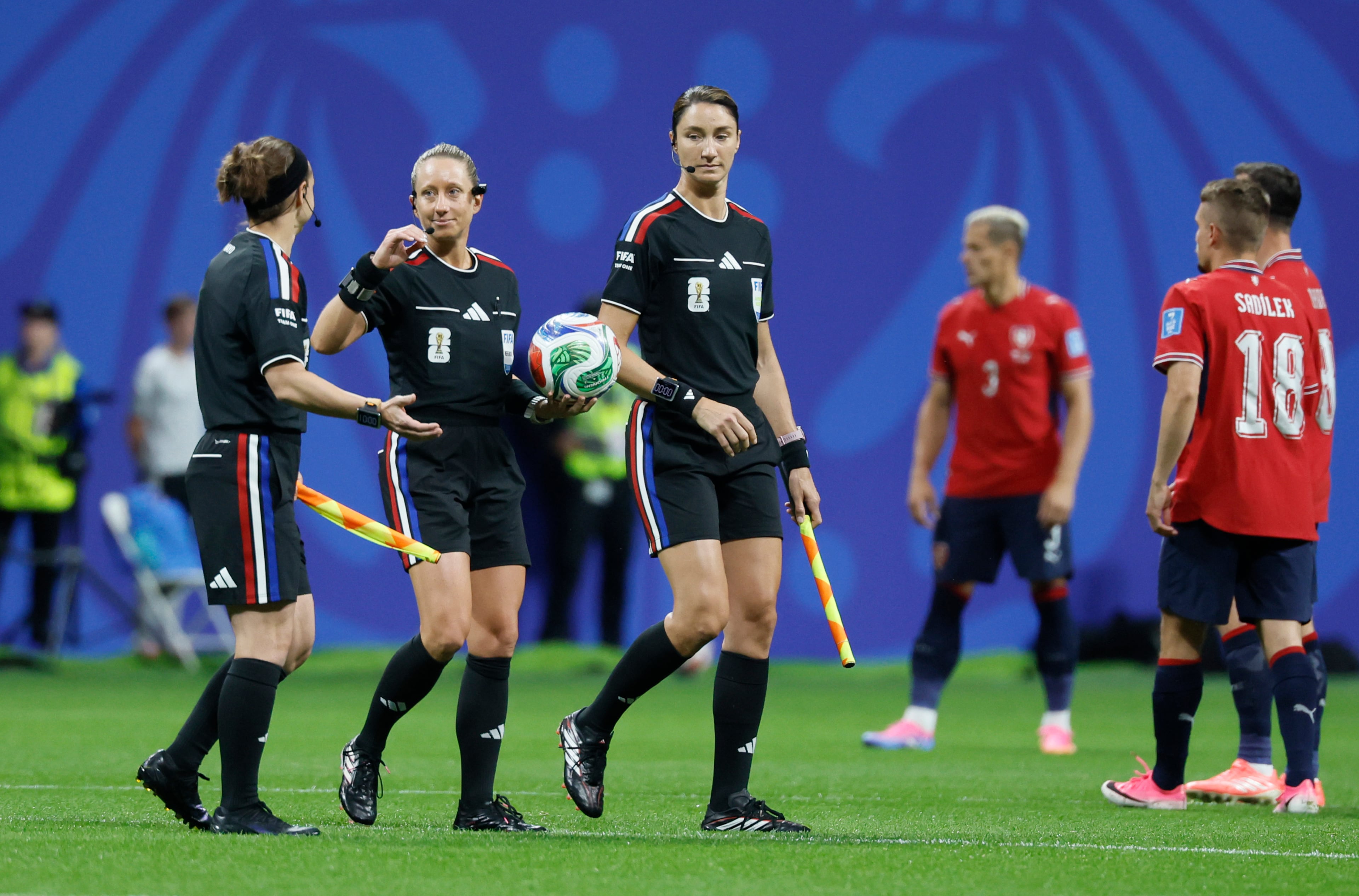 Head referee Tori Penso (center) is the first U.S. woman to be head ref at a World Cup match. She is joined by assistant referees Brooke Mayo (left) and Kathryn Nesbitt before the start of the Czechia vs. South Africa World Cup match at Atlanta Stadium on Thursday, June 18, 2026. (Miguel Martinez/AJC)
