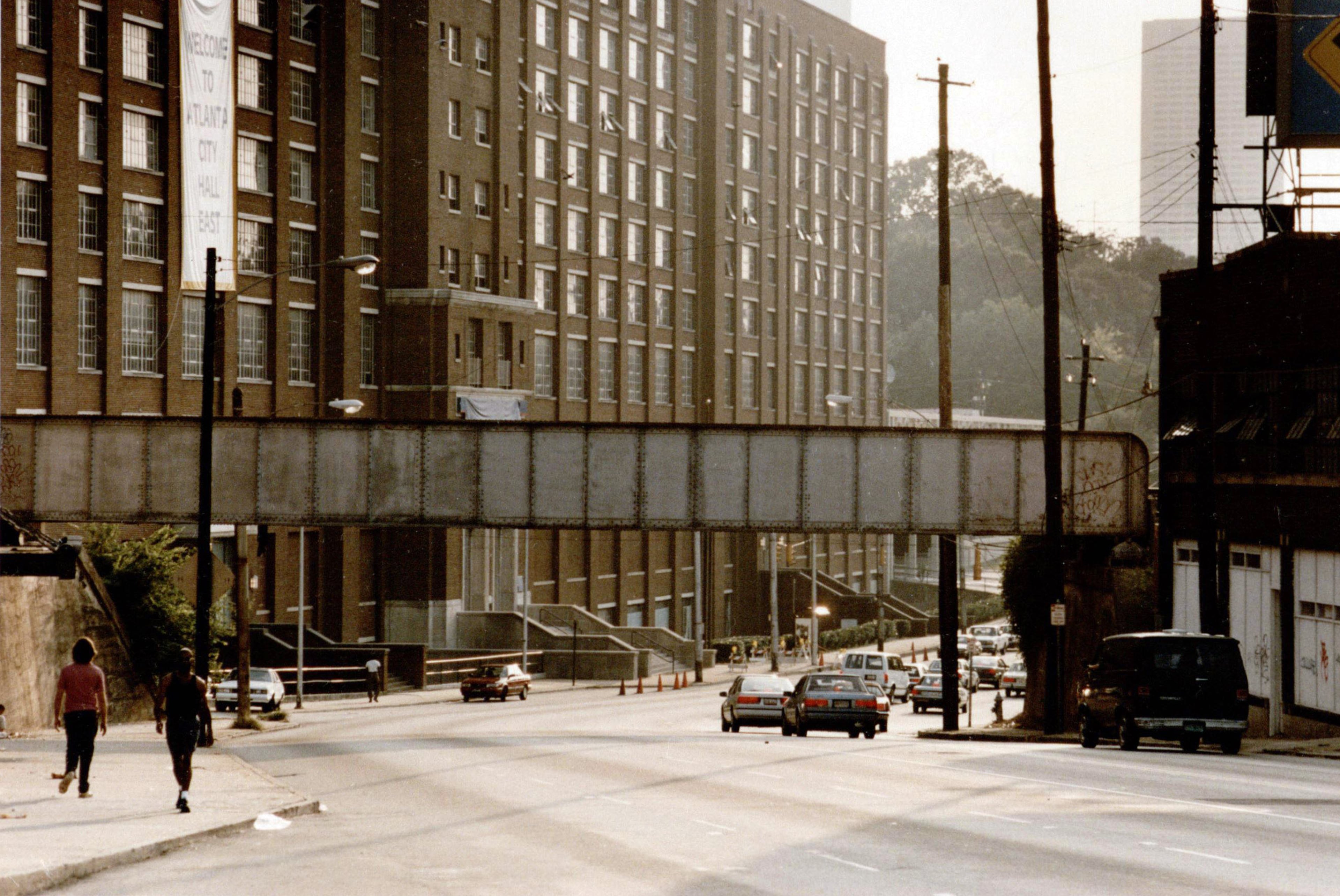 The railroad overpass on Ponce de Leon Avenue, August 30, 1993, with the old Sears building/City Hall East in the background. It's now the Beltline and Ponce City Market.