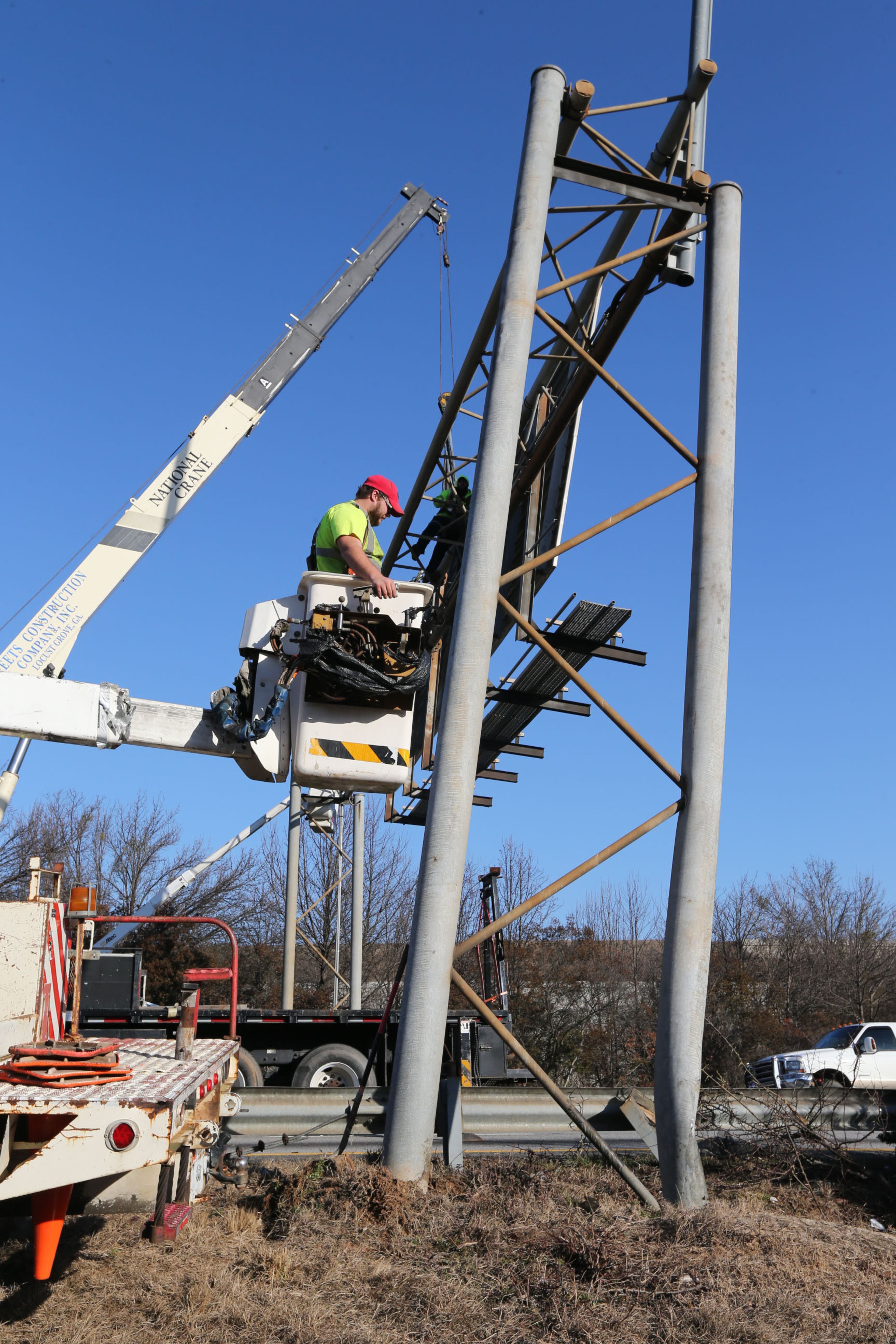 A vehicle left the roadway and slammed into pole holding up an overhead sign on a ramp from I-75 northbound to I-285 westbound in Clayton County. The crash shut the ramp and led to a five-mile backup.