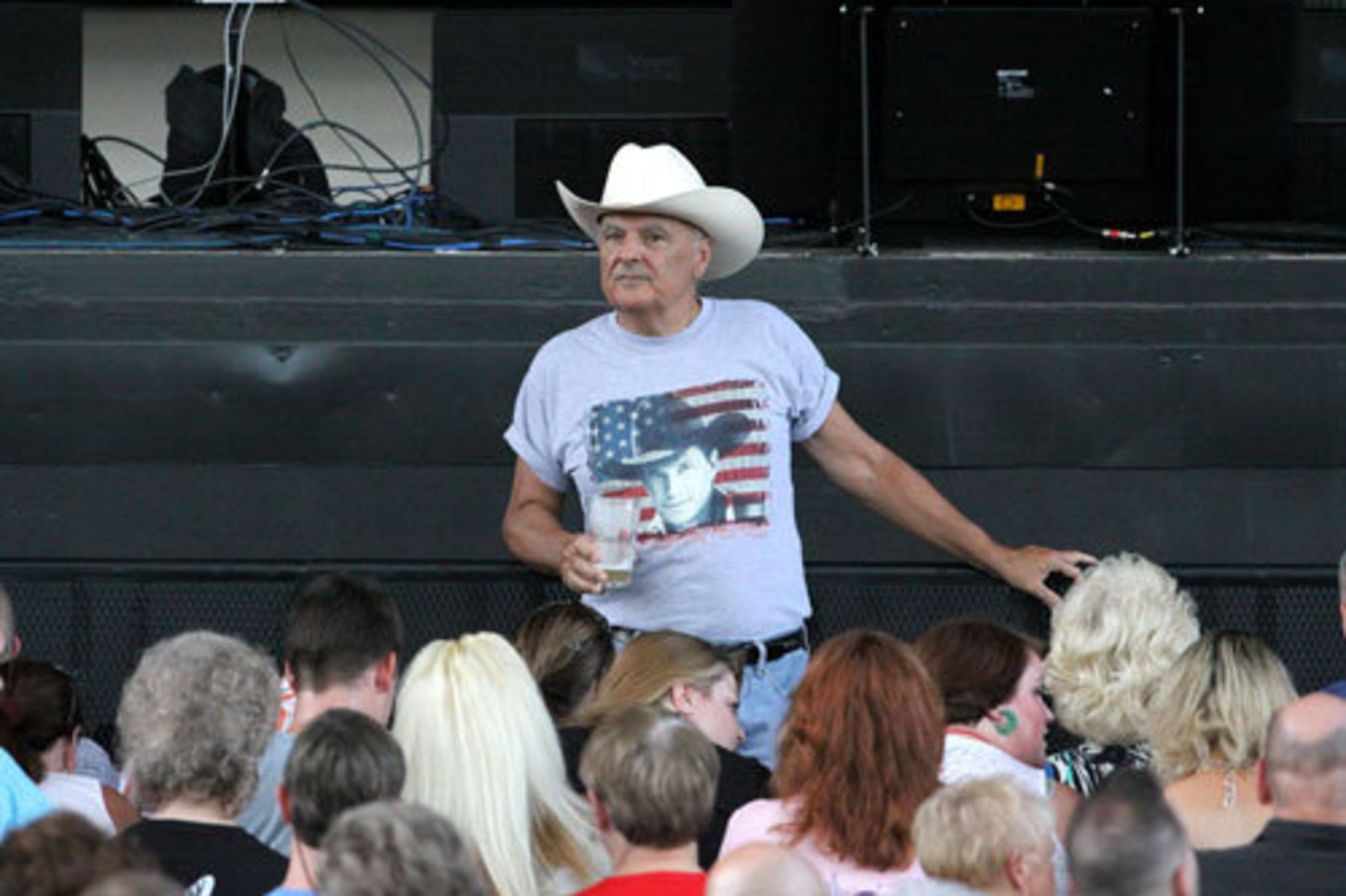 An audience member checks out the crowd before the show at Verizon Wireless Amphitheatre in Alpharetta.