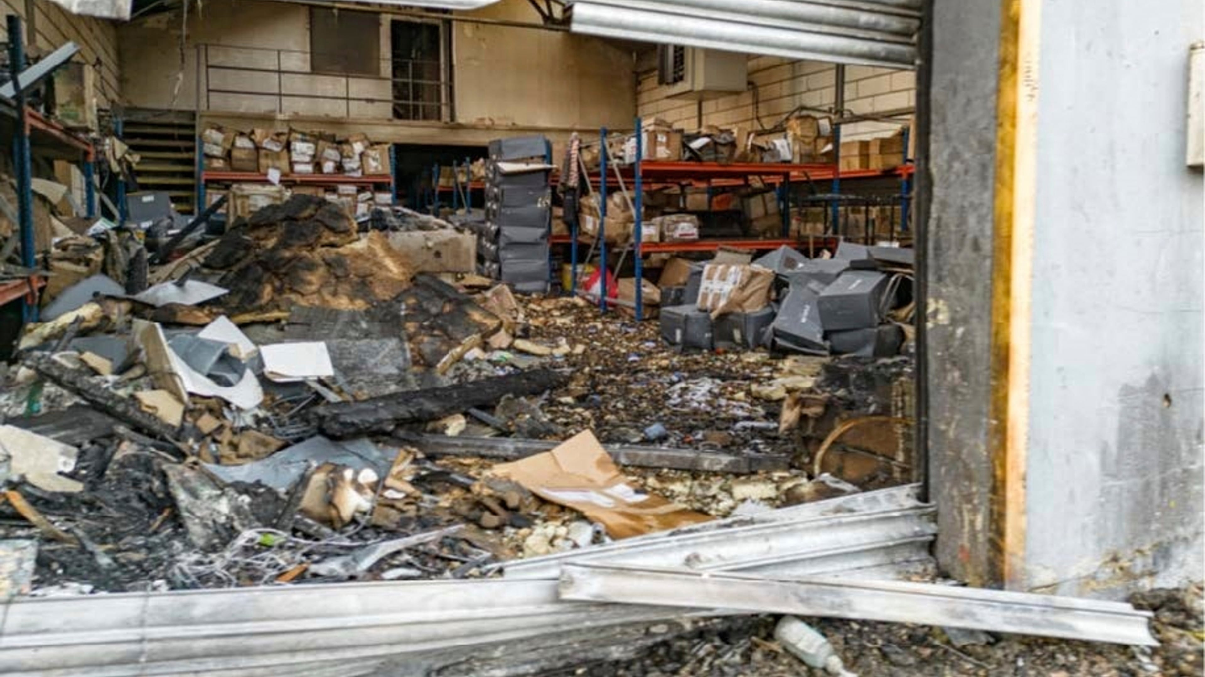 FILE - This 2024 photo provided by the Metropolitan Police shows damage to a warehouse in east London that was storing goods for Ukraine, after a fire that prosecutors said was organized on behalf of Russia's intelligence services. (London Metropolitan Police via AP, File)