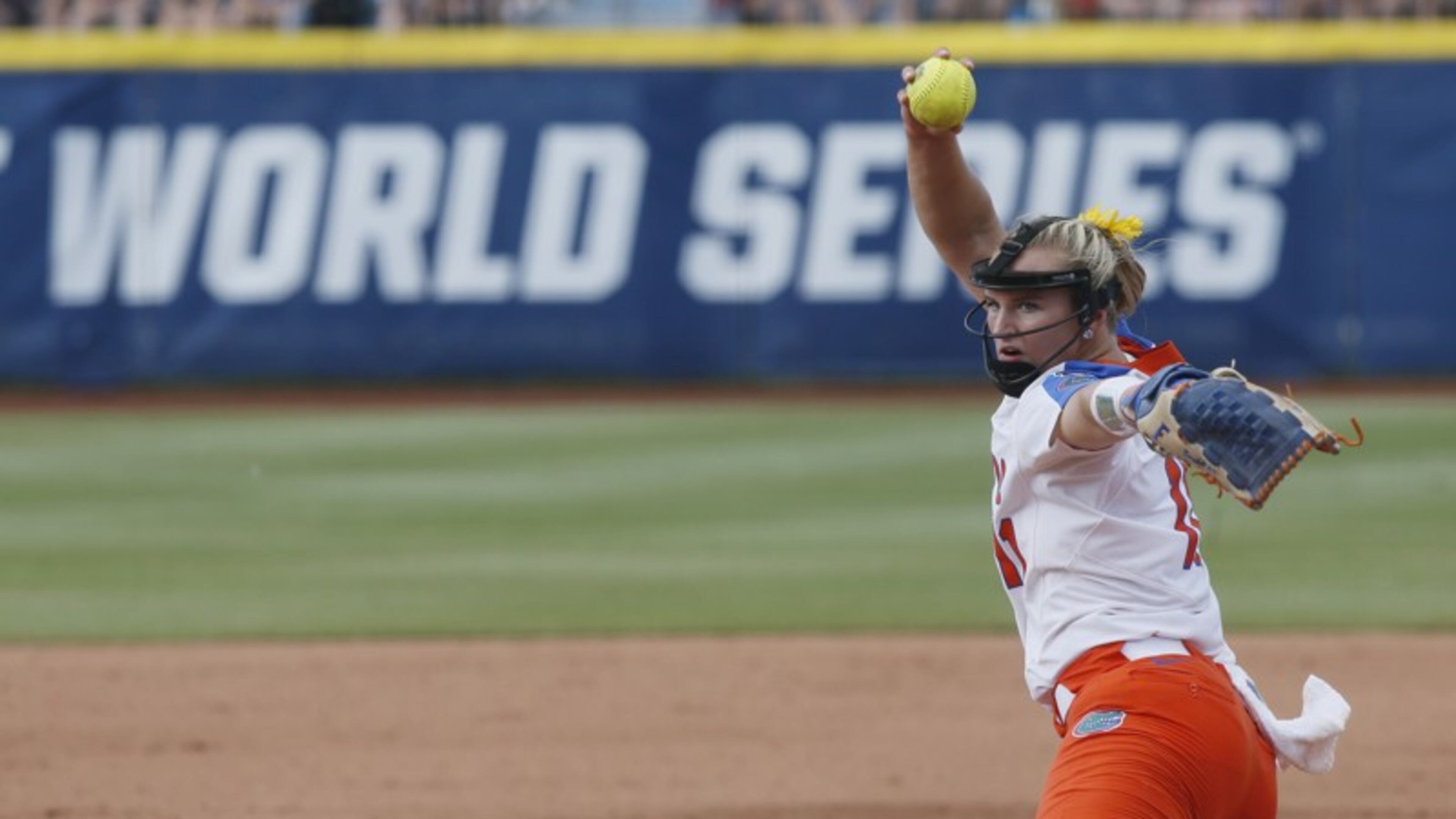 Kelly Barnhill pitching in the Collegiate Softball World Series. CREDIT: AP