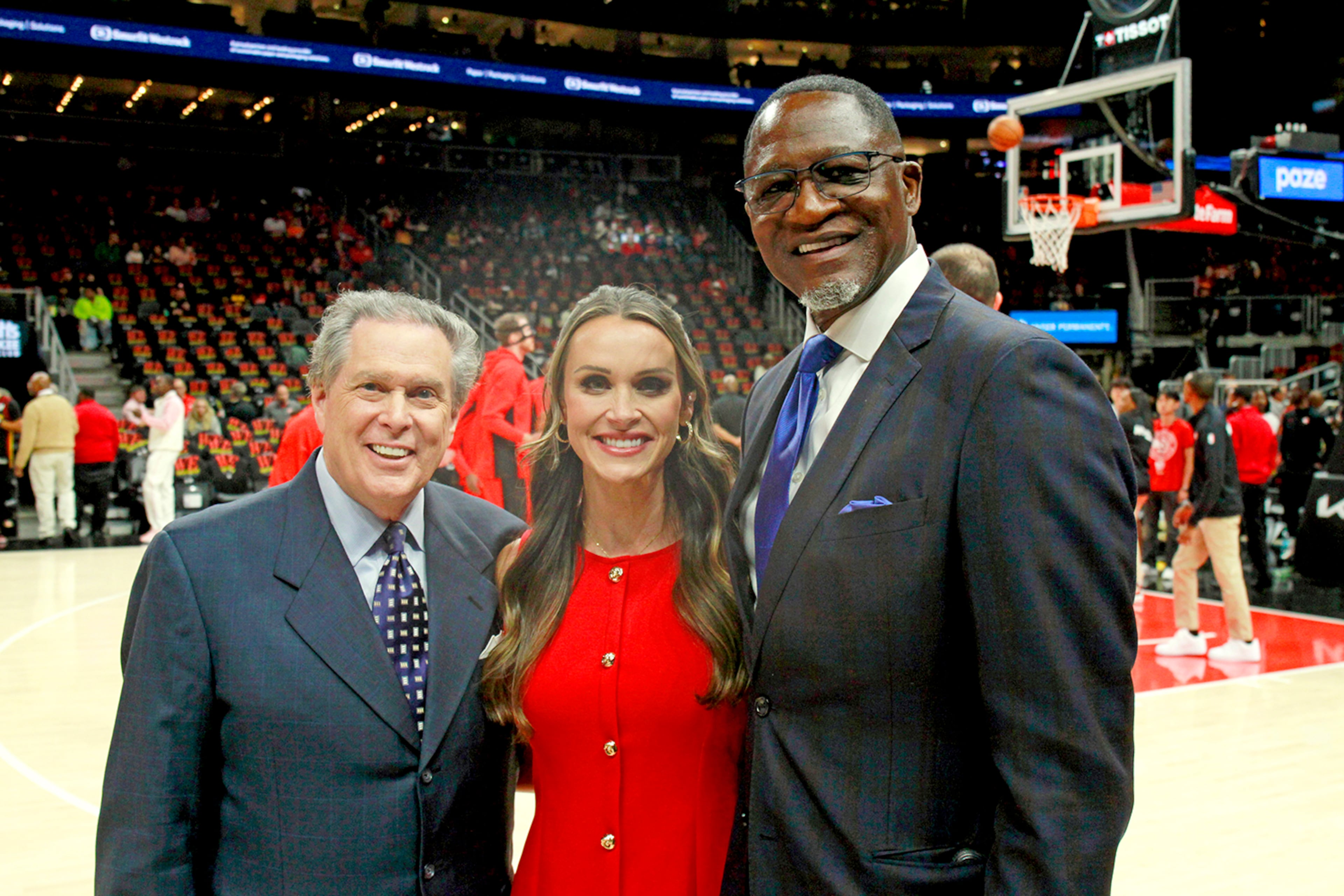 FanDuel Sports TV broadcast crew for the Hawks includes (from left) Bob Rathbun, Madison Hock and Dominique Wilkins on Opening Night 2025.