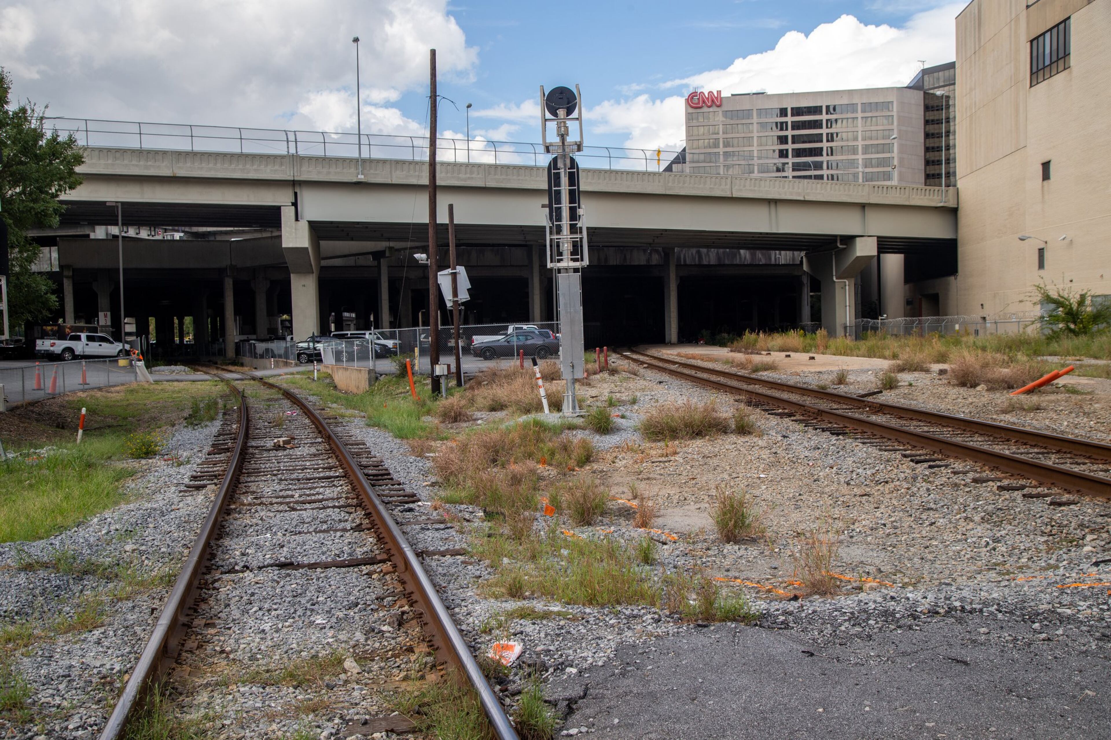 The Gulch is a 40-acre hole in downtown Atlanta where trains run, homeless people sleep and Falcons fans party.