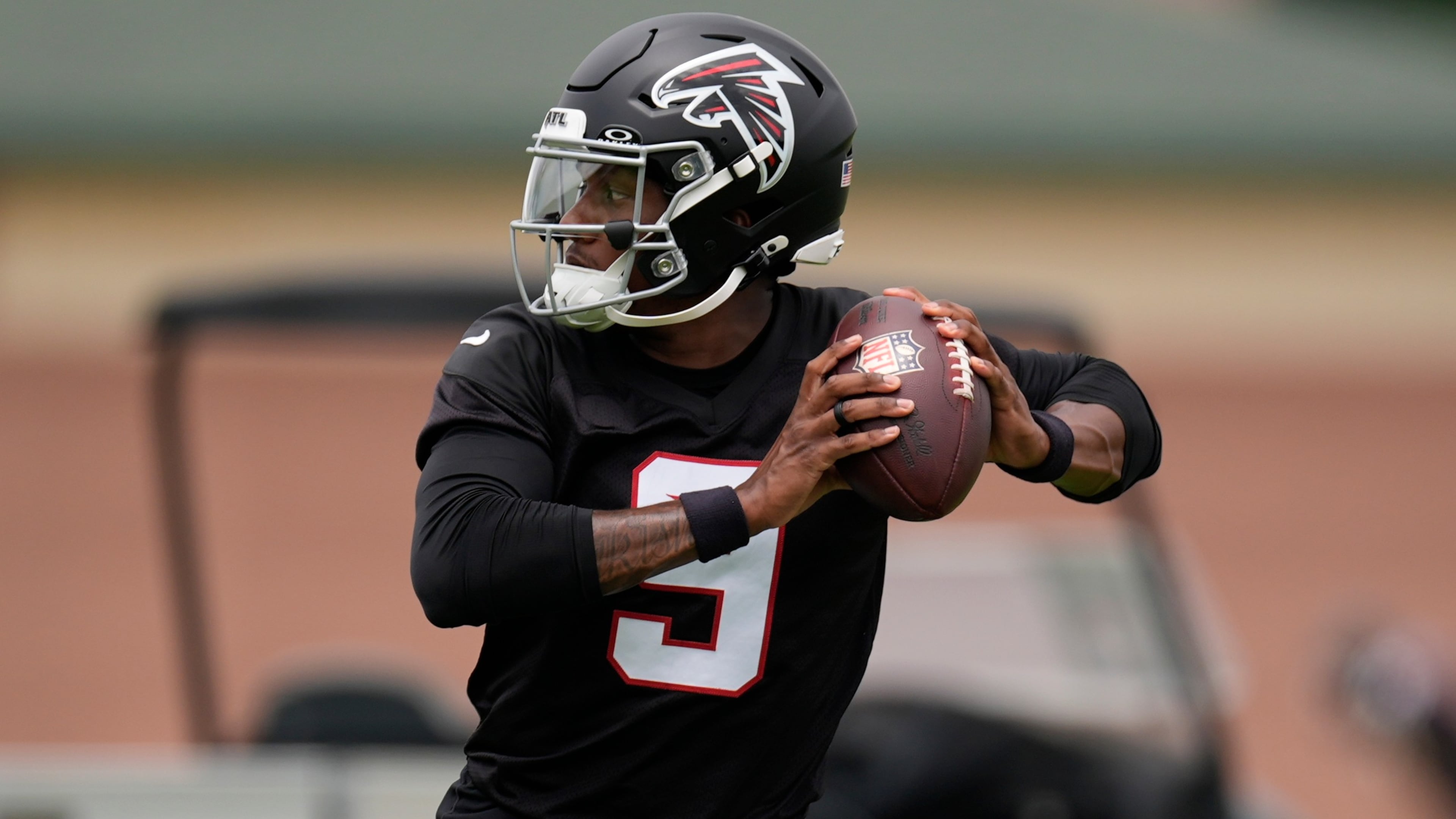 Falcons quarterback Michael Penix Jr. works out during practice on Wednesday, May 27, 2026, in Flowery Branch. Penix is seven months removed from suffering a torn ACL, and admitted Tuesday he still isn’t 100% healthy. (Mike Stewart/AP)