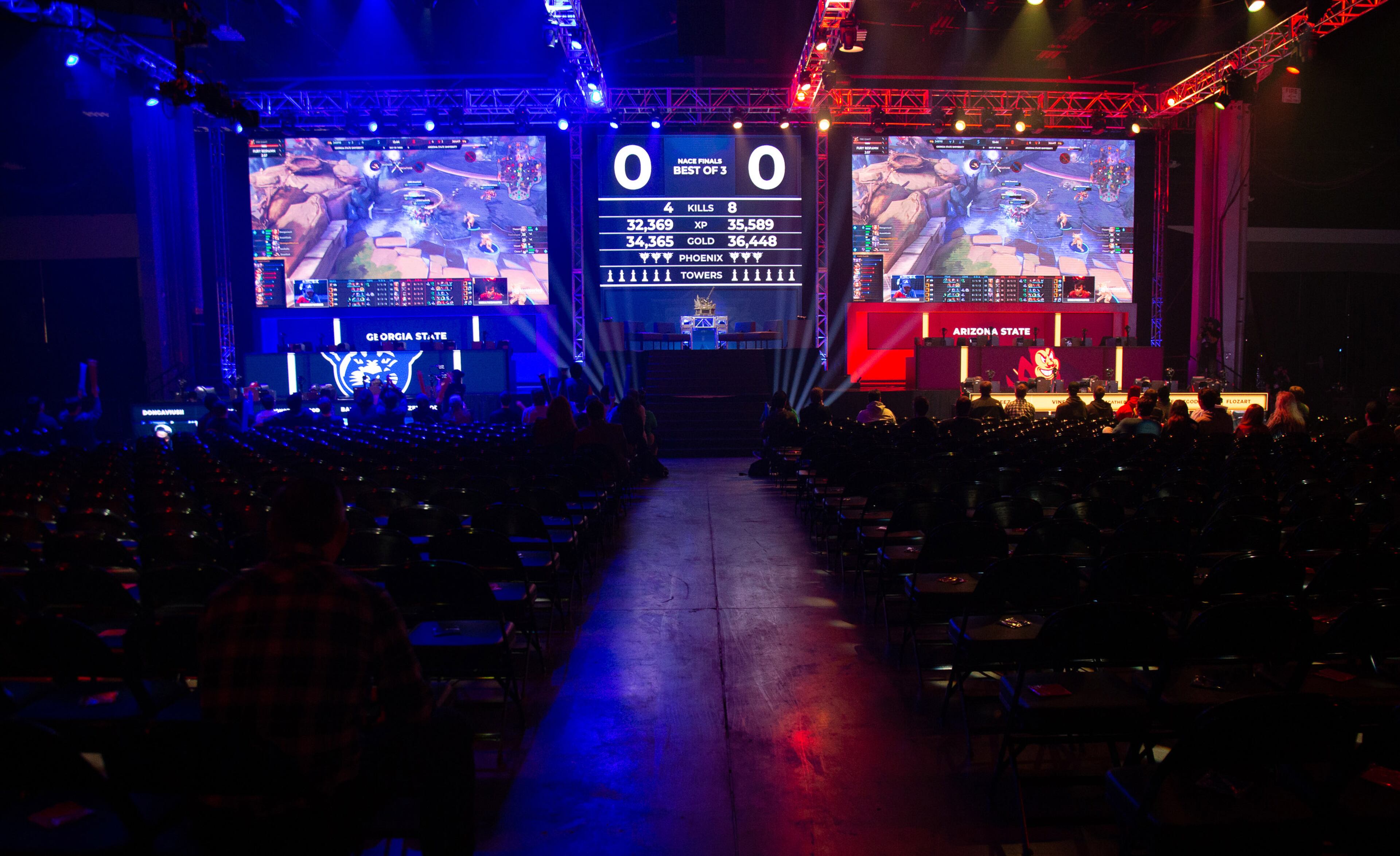 Georgia State University plays the online game Smite against Arizona State University on stage during a college competition at DreamHack Atlanta at the Georgia World Congress Center Sunday, November 17, 2019. STEVE SCHAEFER / SPECIAL TO THE AJC
