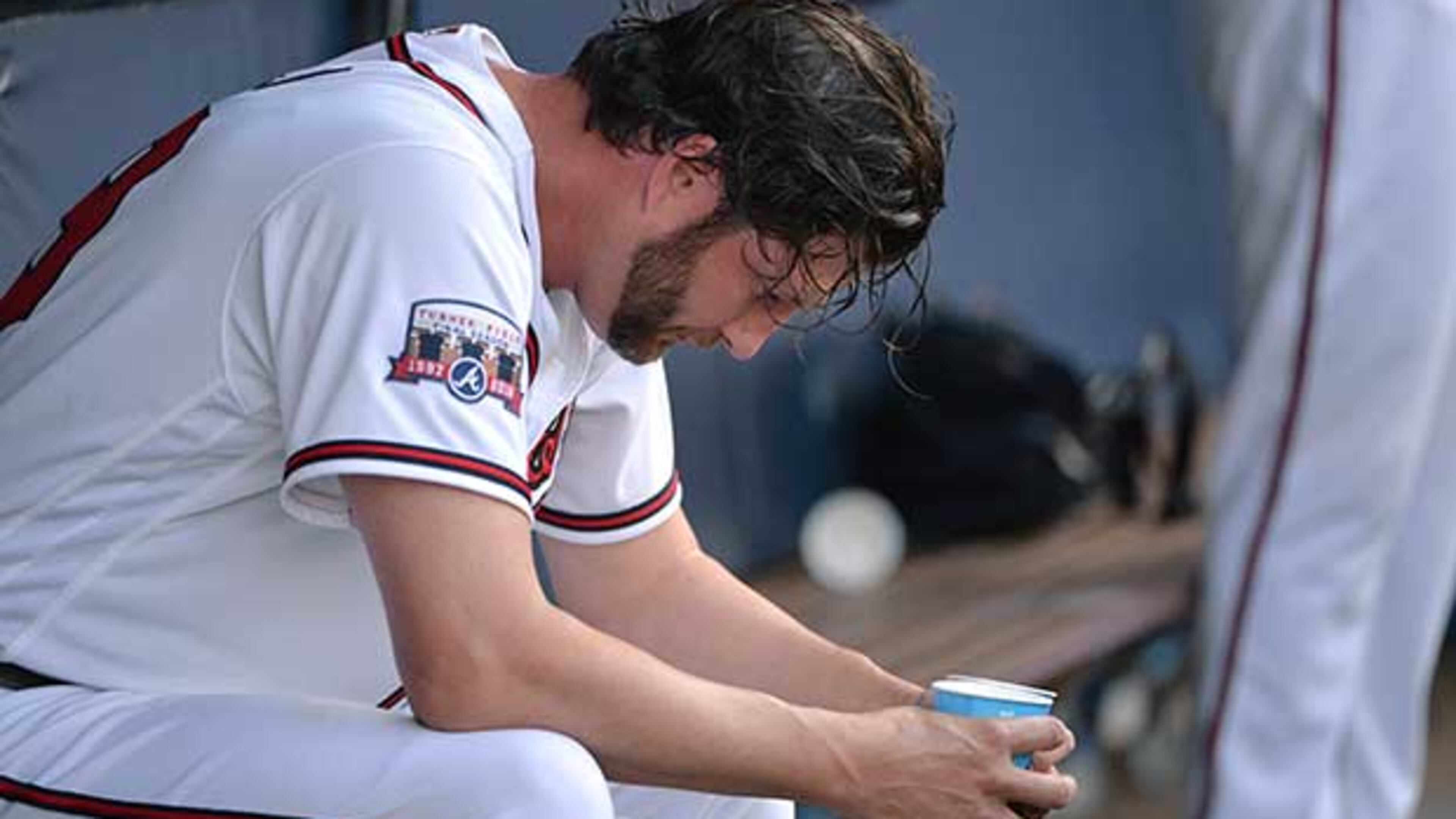 Braves reliever Jason Grilli reacts in dugout during Monday's season-opening loss to the Washington Nationals. Hyosub Shin/hshin@ajc.com