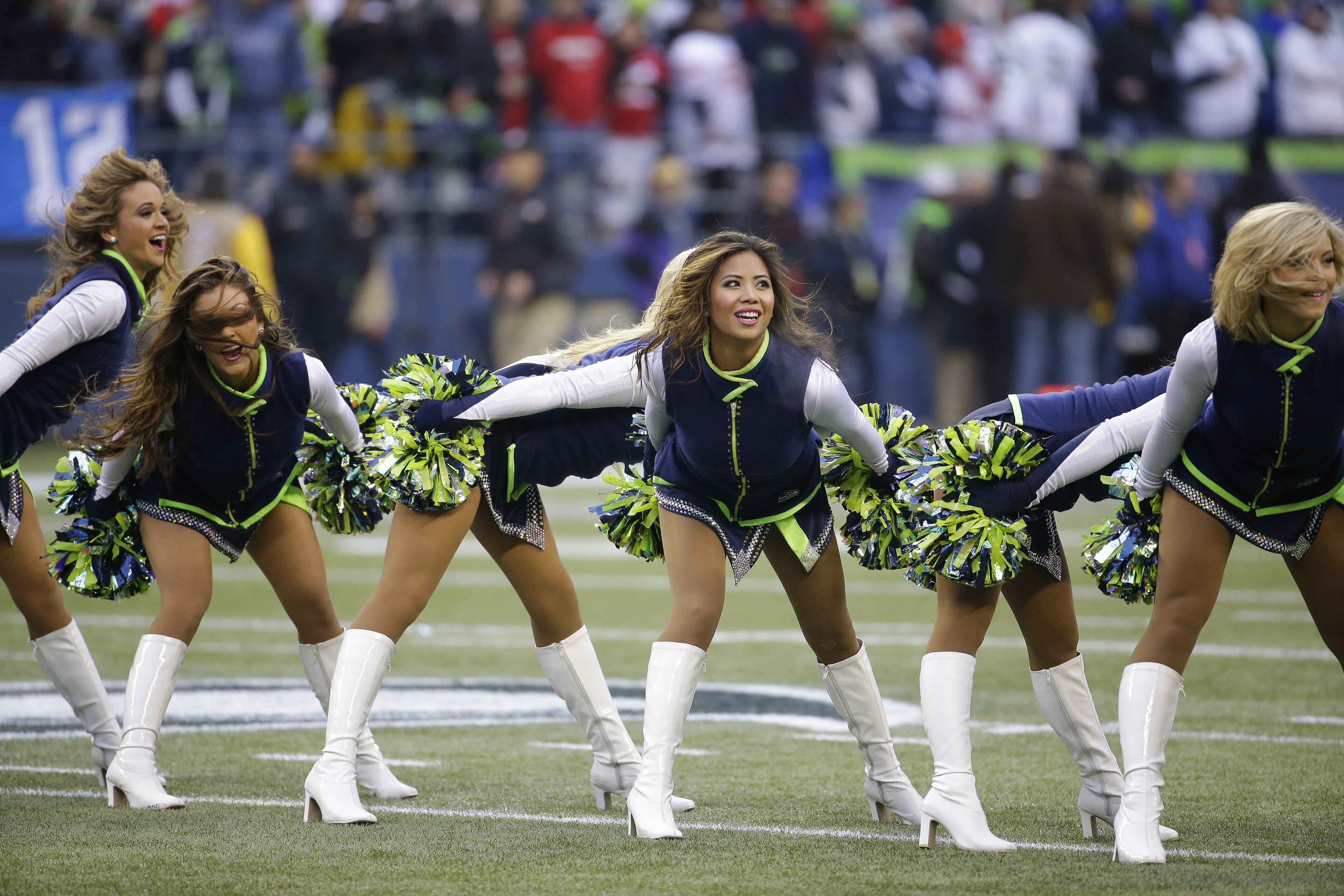 Seattle Seahawks cheerleaders perform before the NFL football NFC Championship game against the San Francisco 49ers on Jan. 19, 2014, in Seattle.