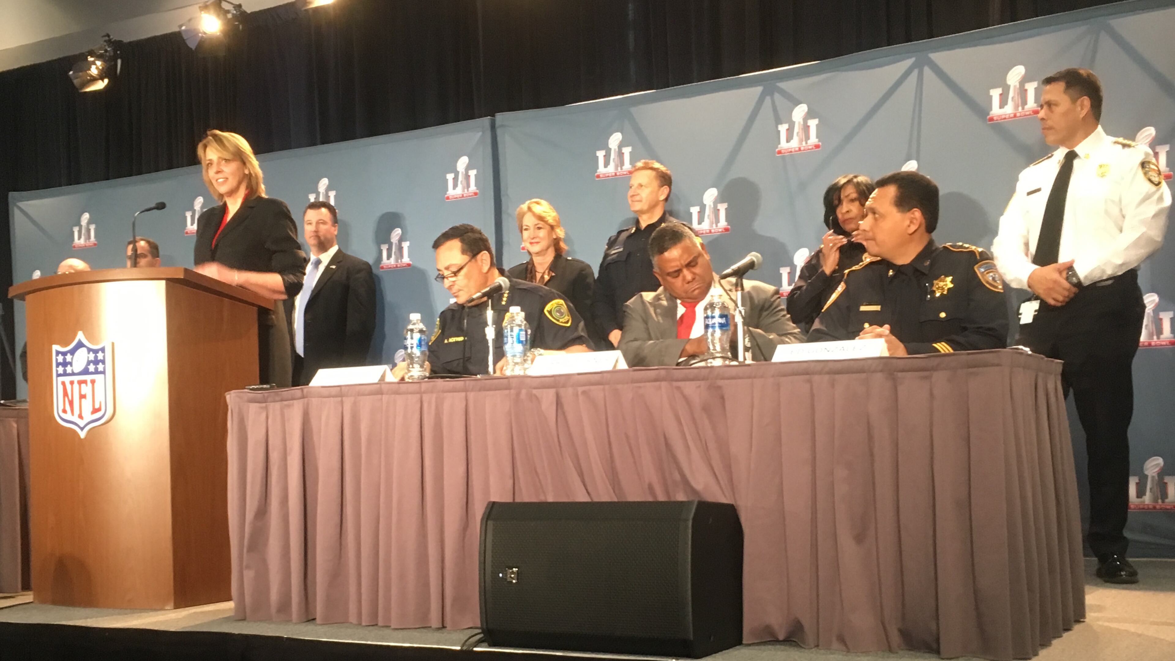 NFL security chief Cathy Lanier, standing, was joined by local and federal authorities including Houston Police Chief Art Acevedo, seated from left, Perrye K. Turner special agent in charge of the FBI s Houston Division and Harris County Sheriff Ed Gonzalez. Photo: Jennifer Brett