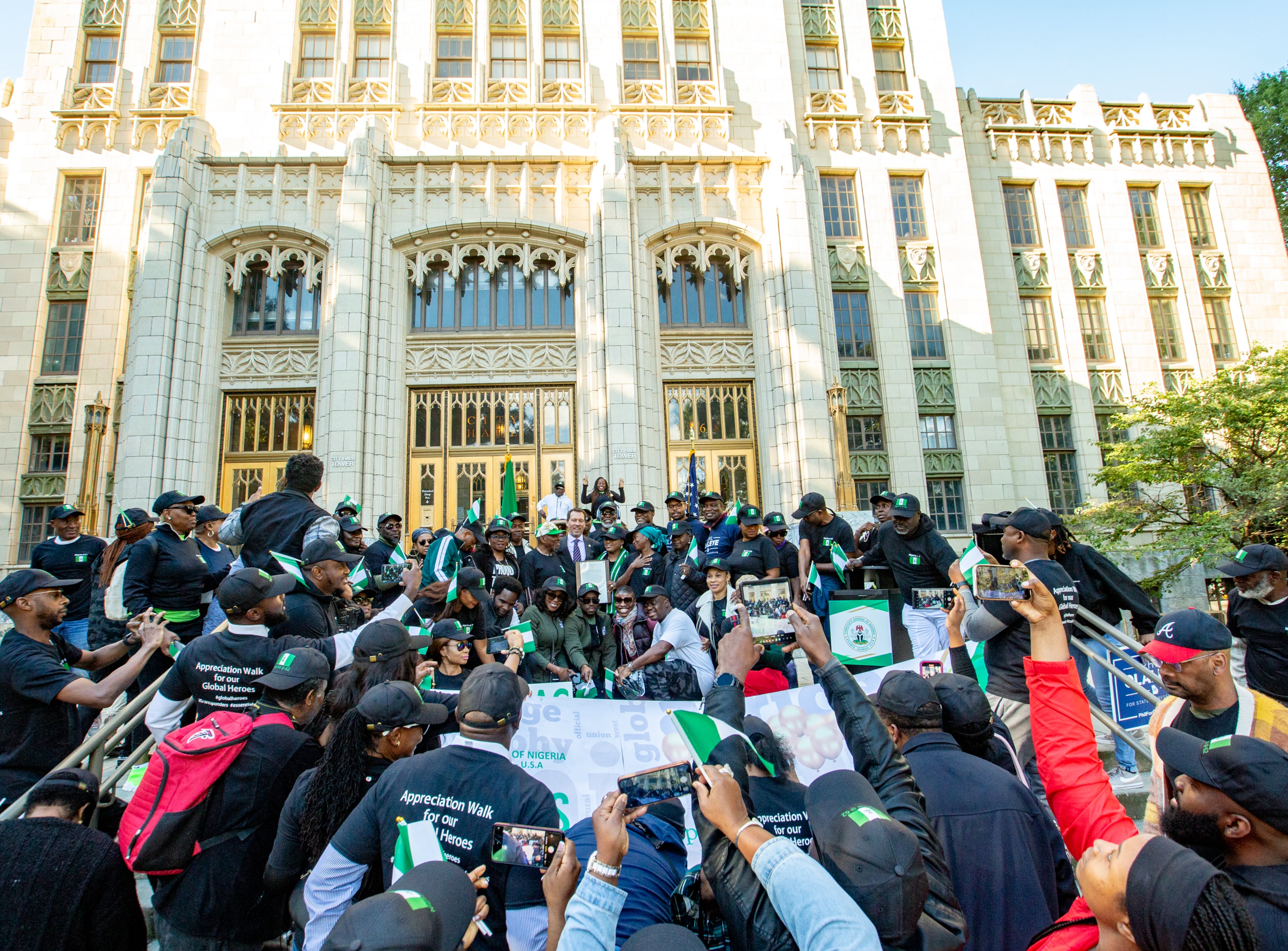 In celebration of Nigeria's Independence Day, Amina Smaila, consul general of the Nigerian Consulate General in Atlanta, and members and supporters of the Nigerian community gather for a group photo at Atlanta City Hall after a formal proclamation presented by Atlanta City Council President Doug Shipman on Saturday, Oct 1, 2022. (Photo: Jenni Girtman for The Atlanta Journal-Constitution)
