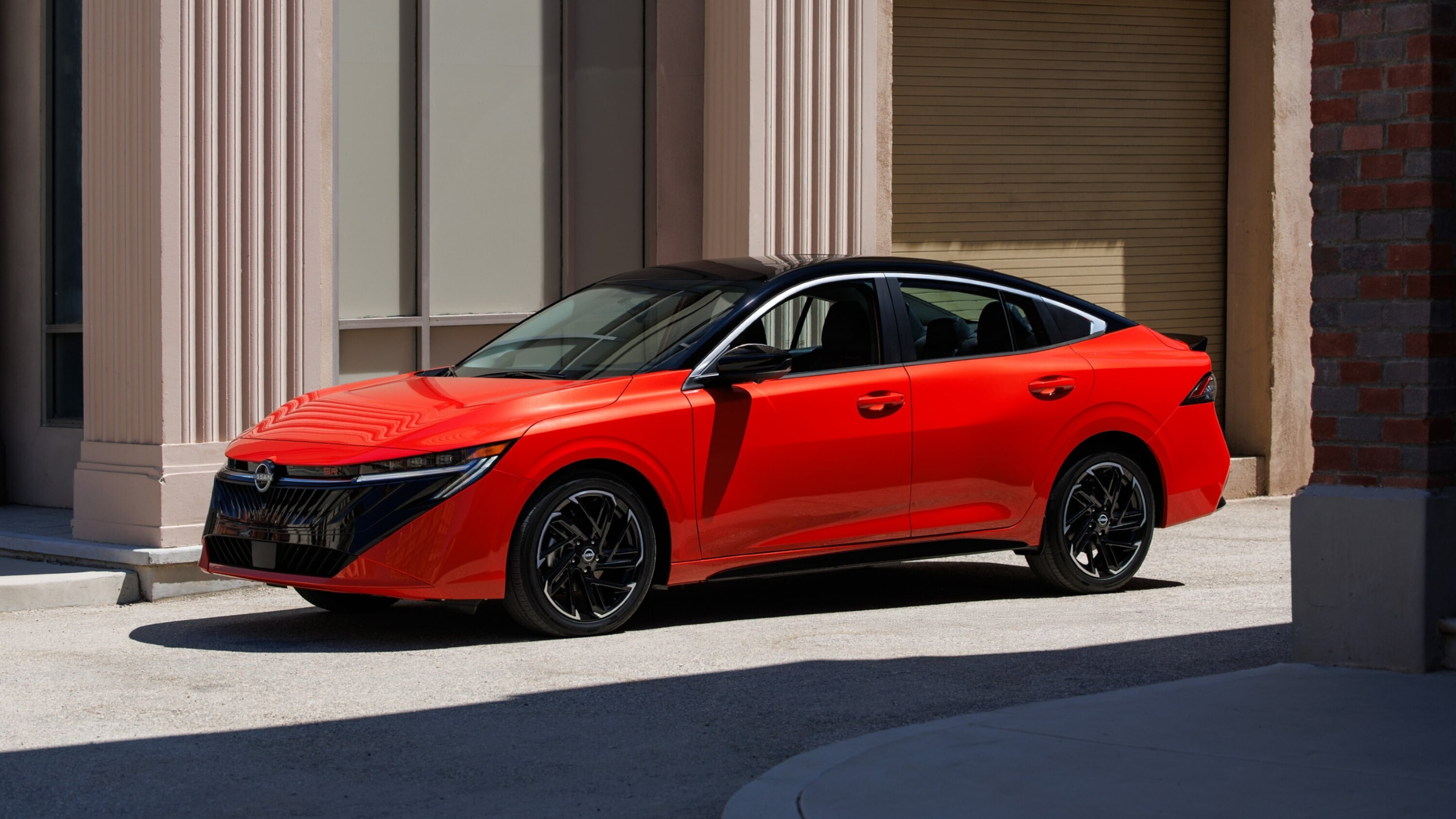 This photo provided by Nissan shows the 2026 Sentra sedan. The redesigned Sentra features distinctive styling and an updated interior with new technology features. (Courtesy of Nissan North America via AP)