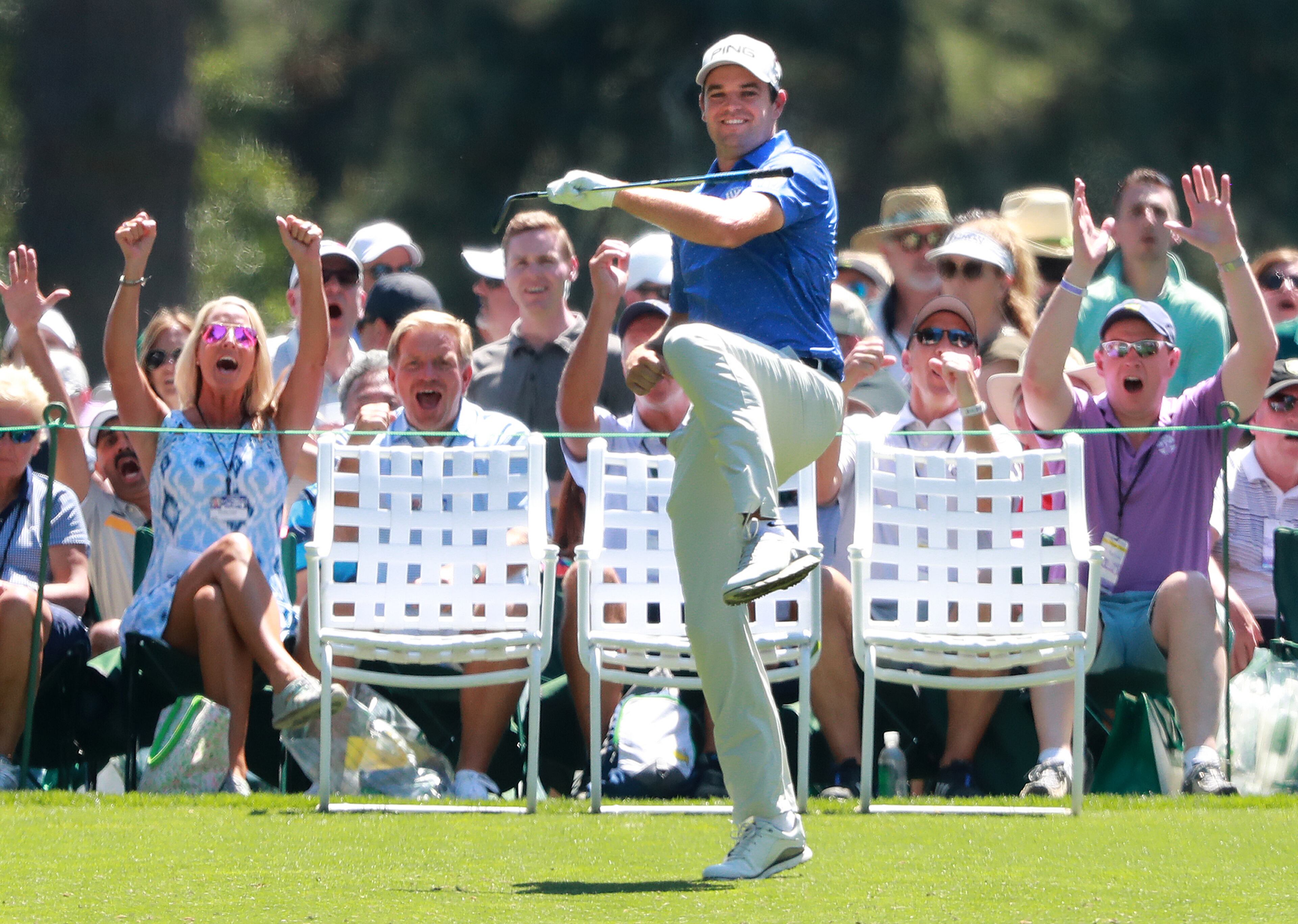 Corey Conners and the patrons react as he just misses a hole-in one on the first hole during the Masters Par -3 Contest at Augusta National Golf Club. Curtis Compton/ccompton@ajc.com