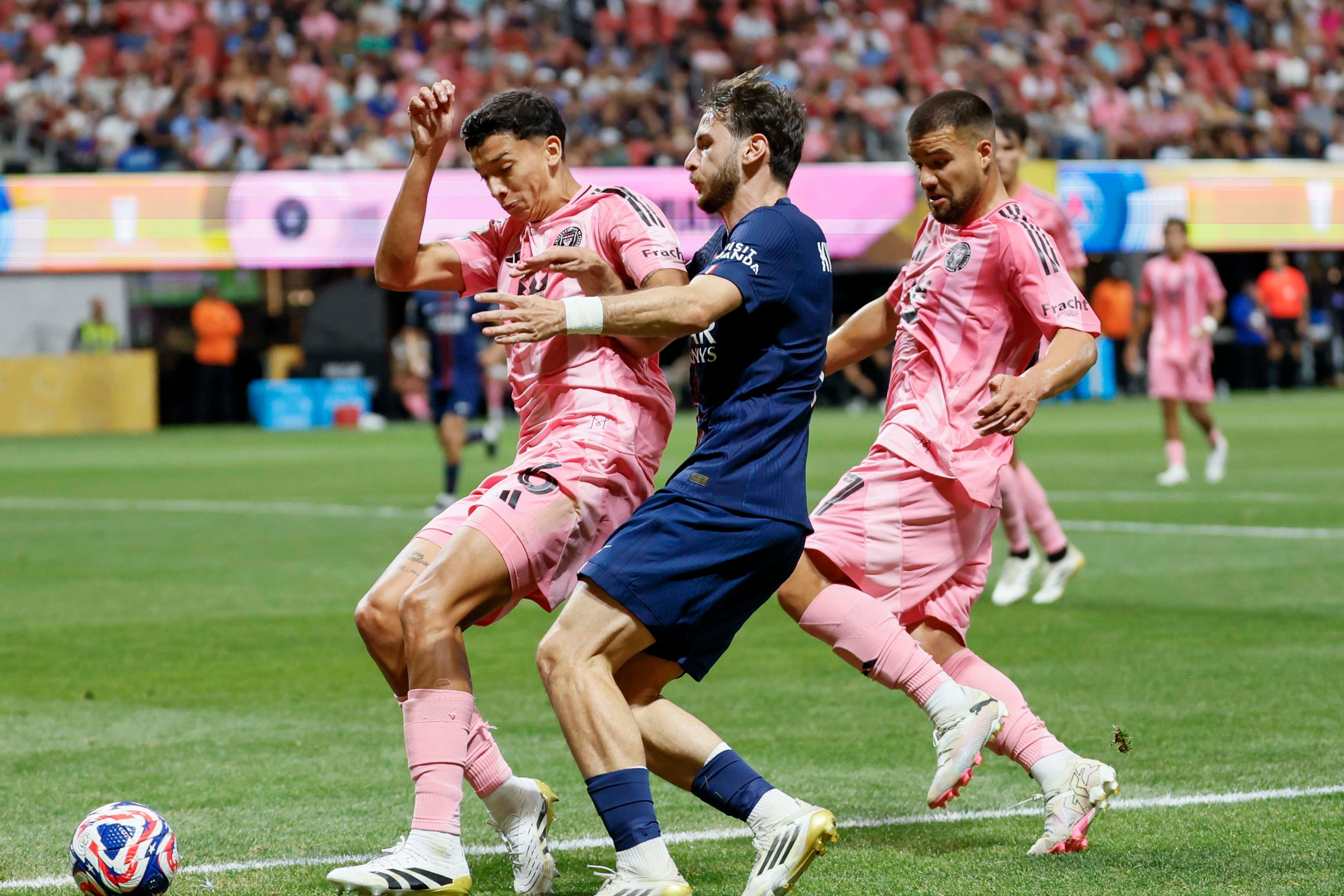Paris Saint-Germain forward Khvicha Kvaratskhelia (7) battles for possession against Inter Miami midfielder Tomás Aviles (6) during the Club World Cup round of 16 soccer match between Paris Saint-Germain FC and Inter Miami in Atlanta, Georgia, on Sunday, June 29, 2025.
(Miguel Martinez/ AJC)