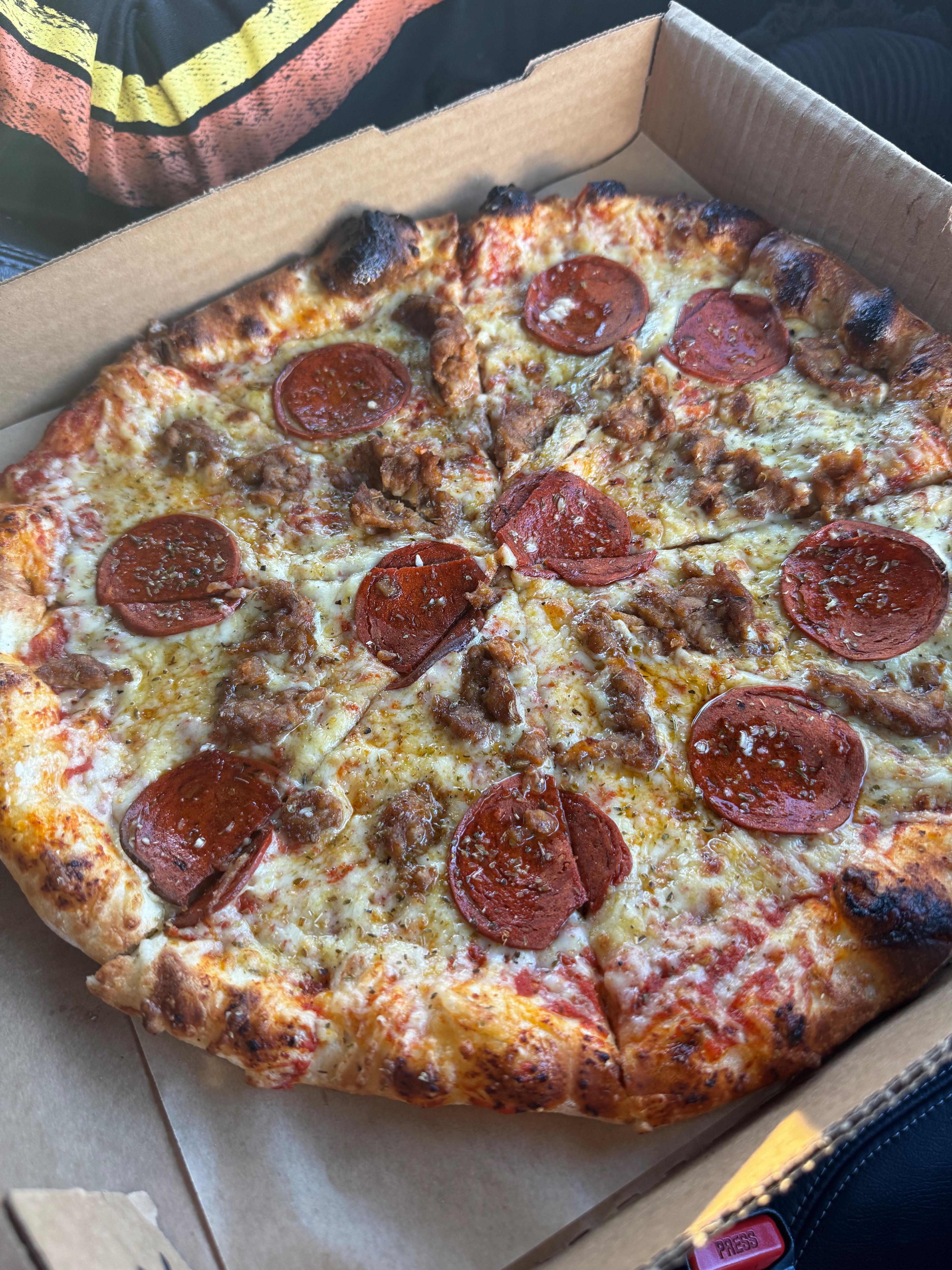 The Come la Carne pizza from Pizza Verdura Sincera is loaded with plant-based pepperoni and a garlic-fennel Italian sausage. (Justin Brown for the AJC)