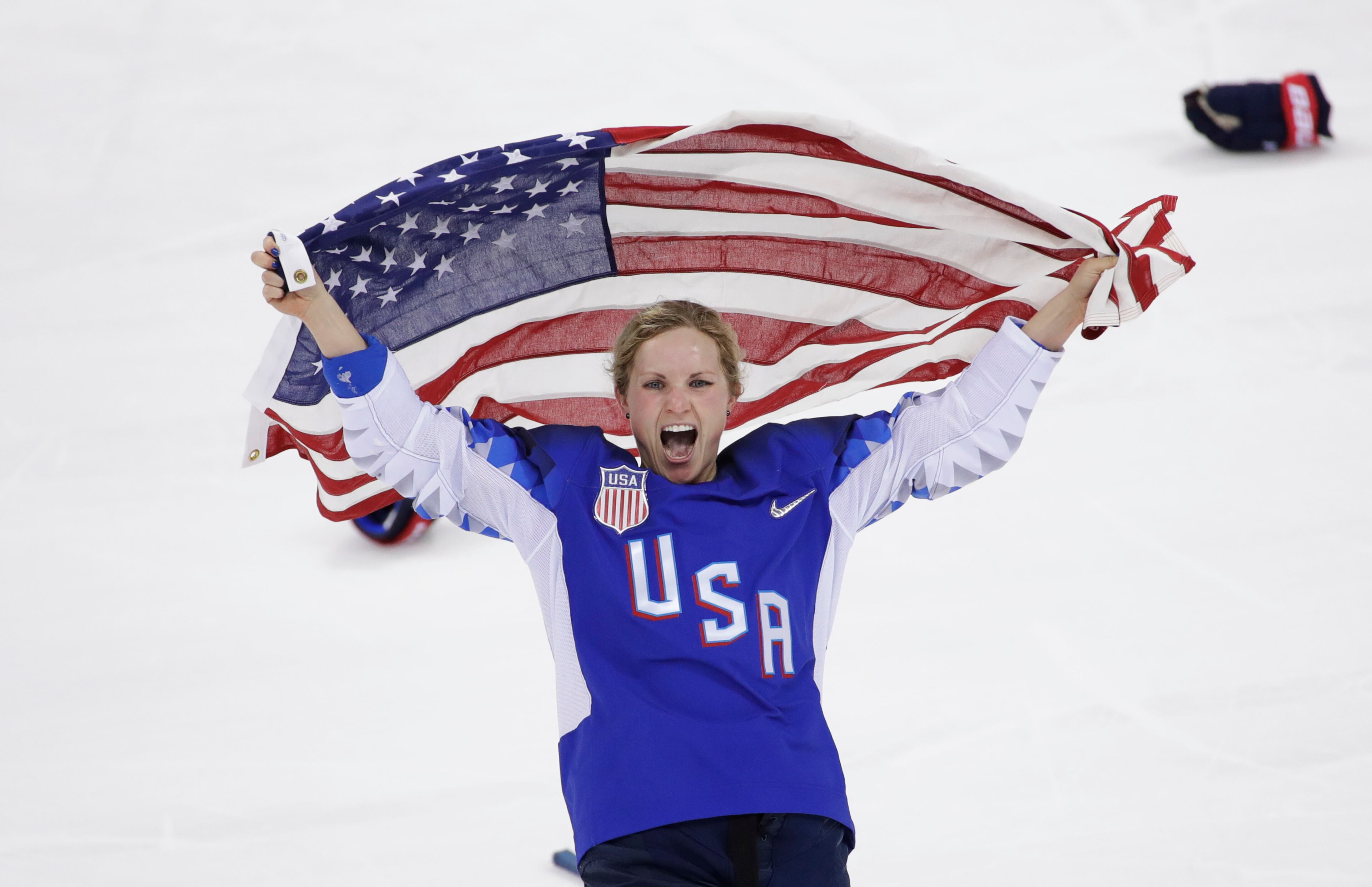 Jocelyne Lamoureux-Davidson (17), of the United States, celebrates after winning against Canada in the women's gold medal hockey game at the 2018 Winter Olympics in Gangneung, South Korea, Thursday, Feb. 22, 2018. (AP Photo/Matt Slocum)