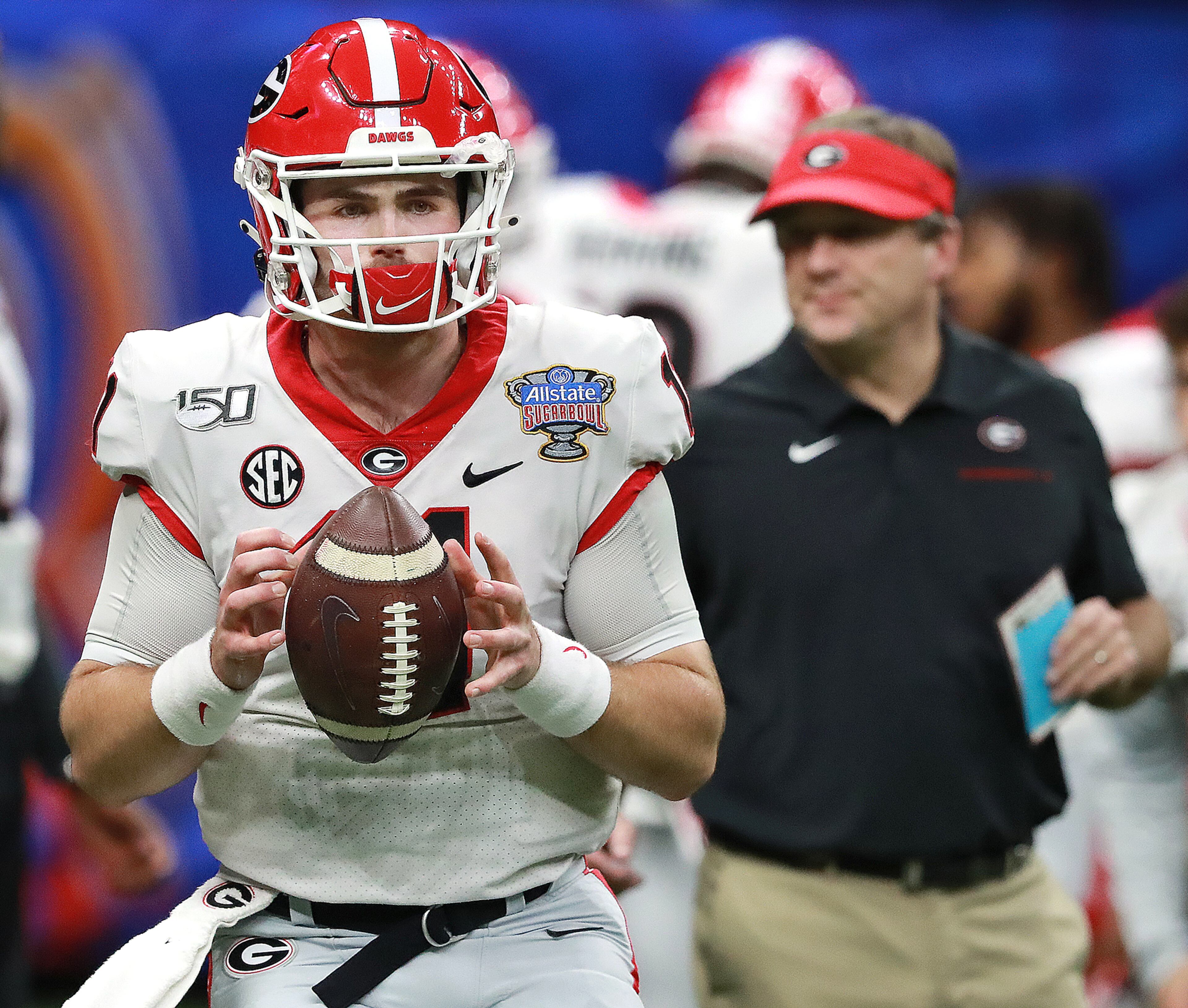 Georgia quarterback Jake Fromm and head coach Kirby Smart prepare to play Baylor in the Sugar Bowl NCAA college football game at the Superdome on Wednesday, January 1, 2020, in New Orleans. Curtis Compton ccompton@ajc.com