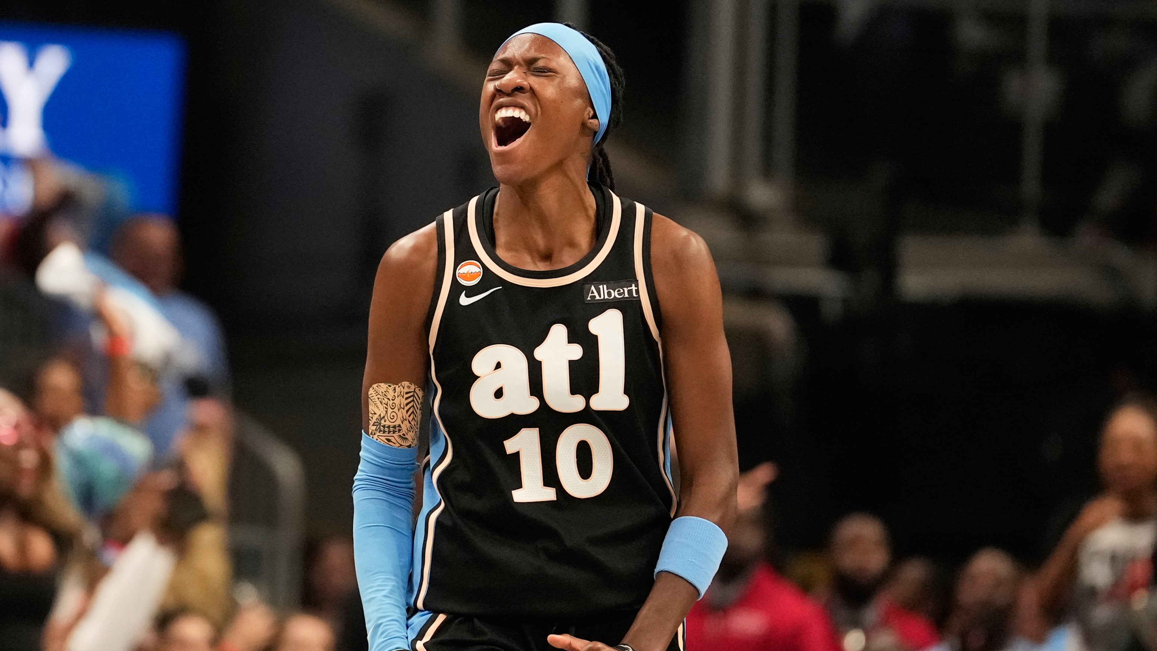Atlanta Dream guard Rhyne Howard (10) celebrates scoring during the first half of Game 3 of the WNBA basketball finals against the Golden State Valkyries on Wednesday, Oct. 21, 2026, in Atlanta. (AP Photo/Brynn Anderson)